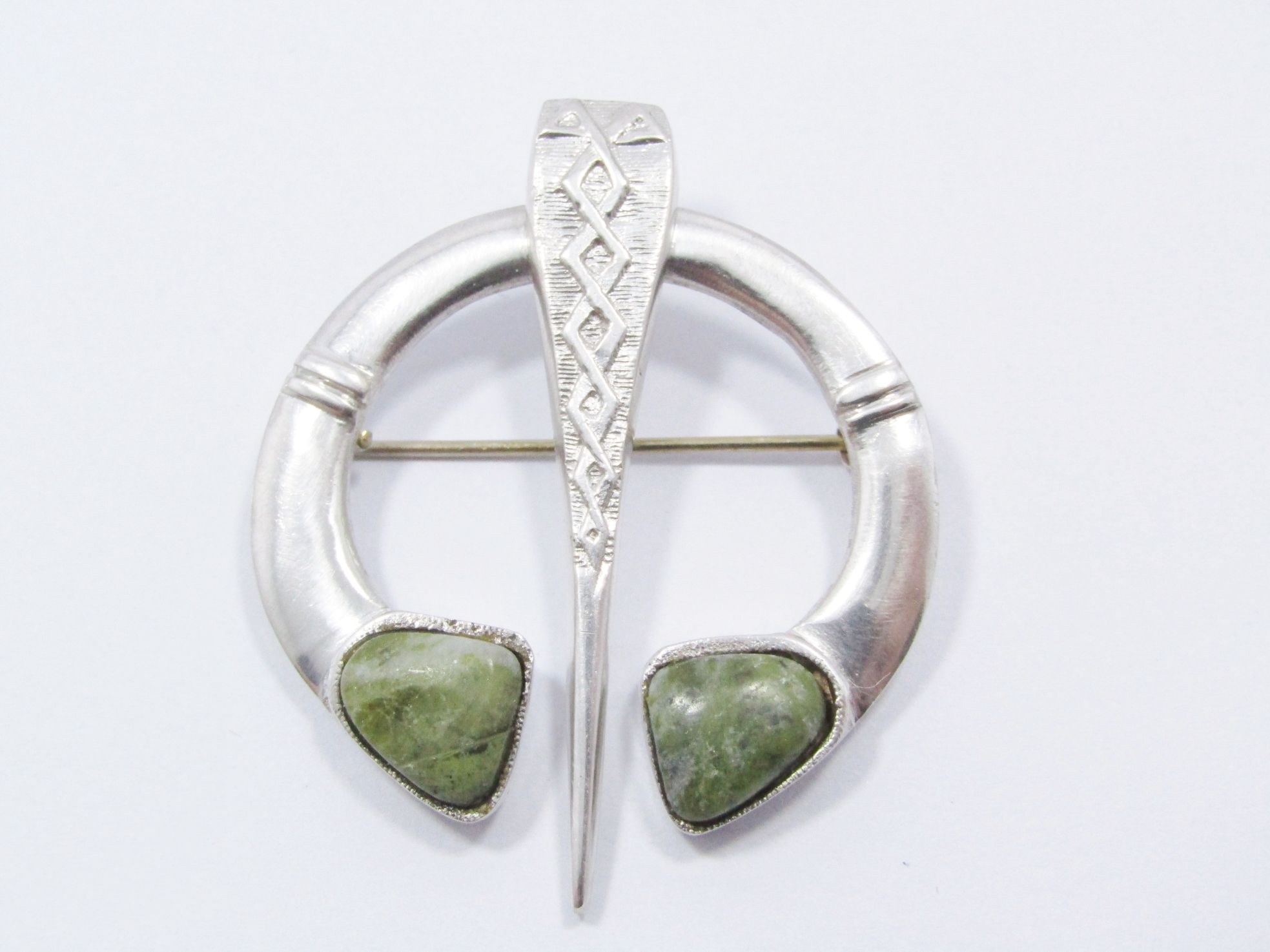 A Gorgeous Irish Tara Brooch pin With a Marble Stone inlay in Sterling Silver.
