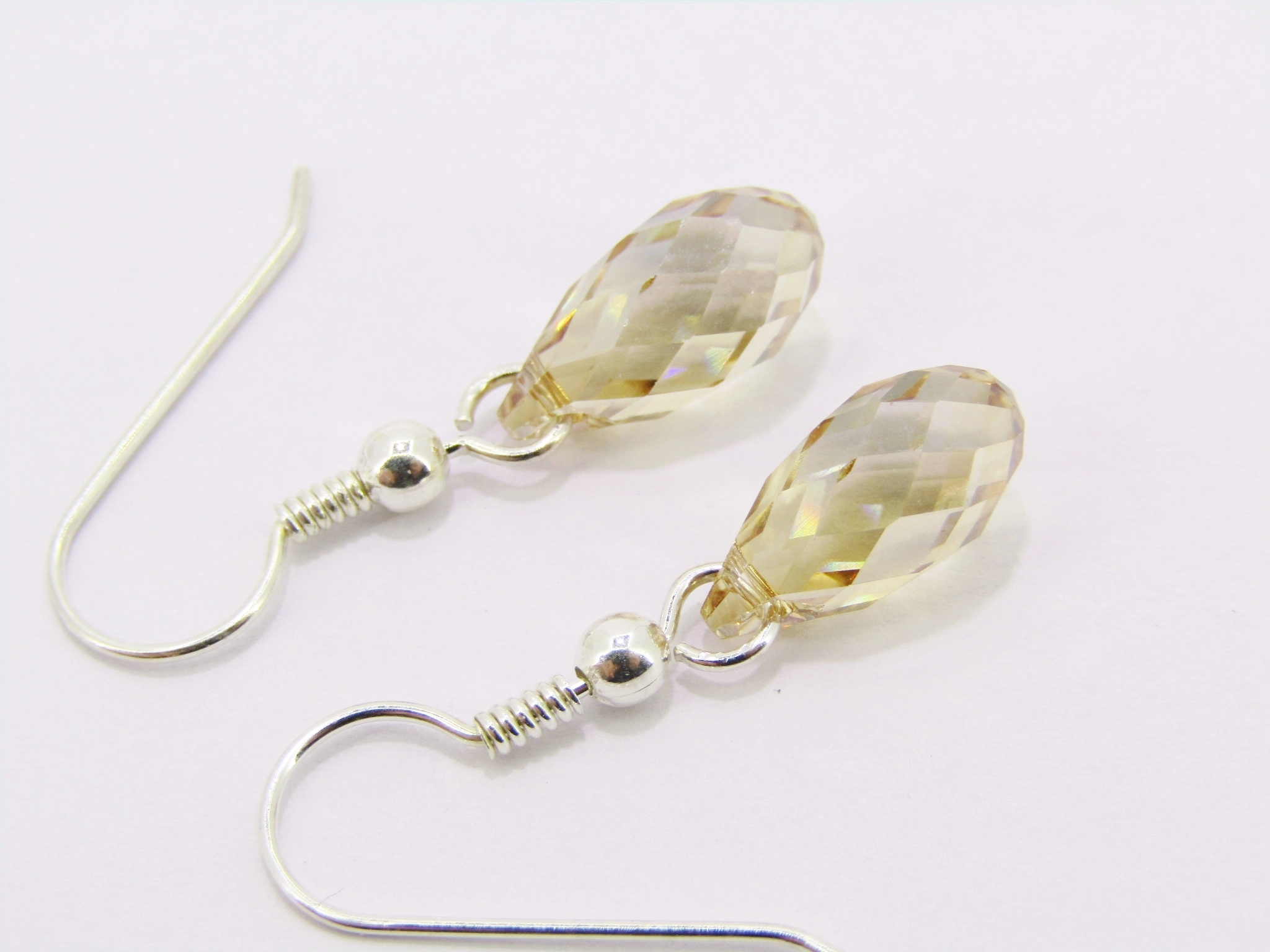 A Beautiful Pair of Champaign Color Swarovski Crystals Drop Earrings in Sterling Silver.