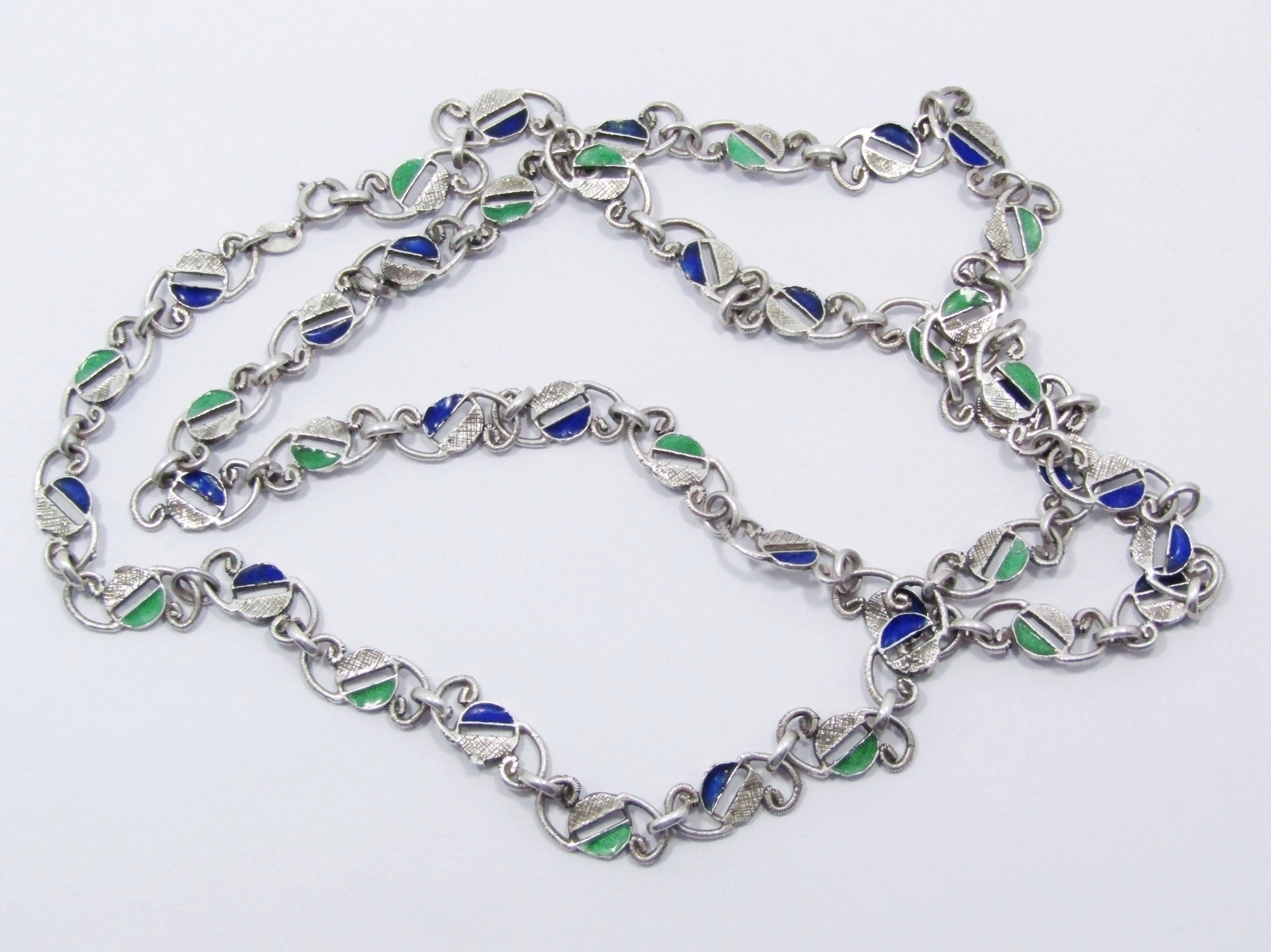 A Stunning Long Fancy Link Necklace With a Enamel Inlay in Silver.