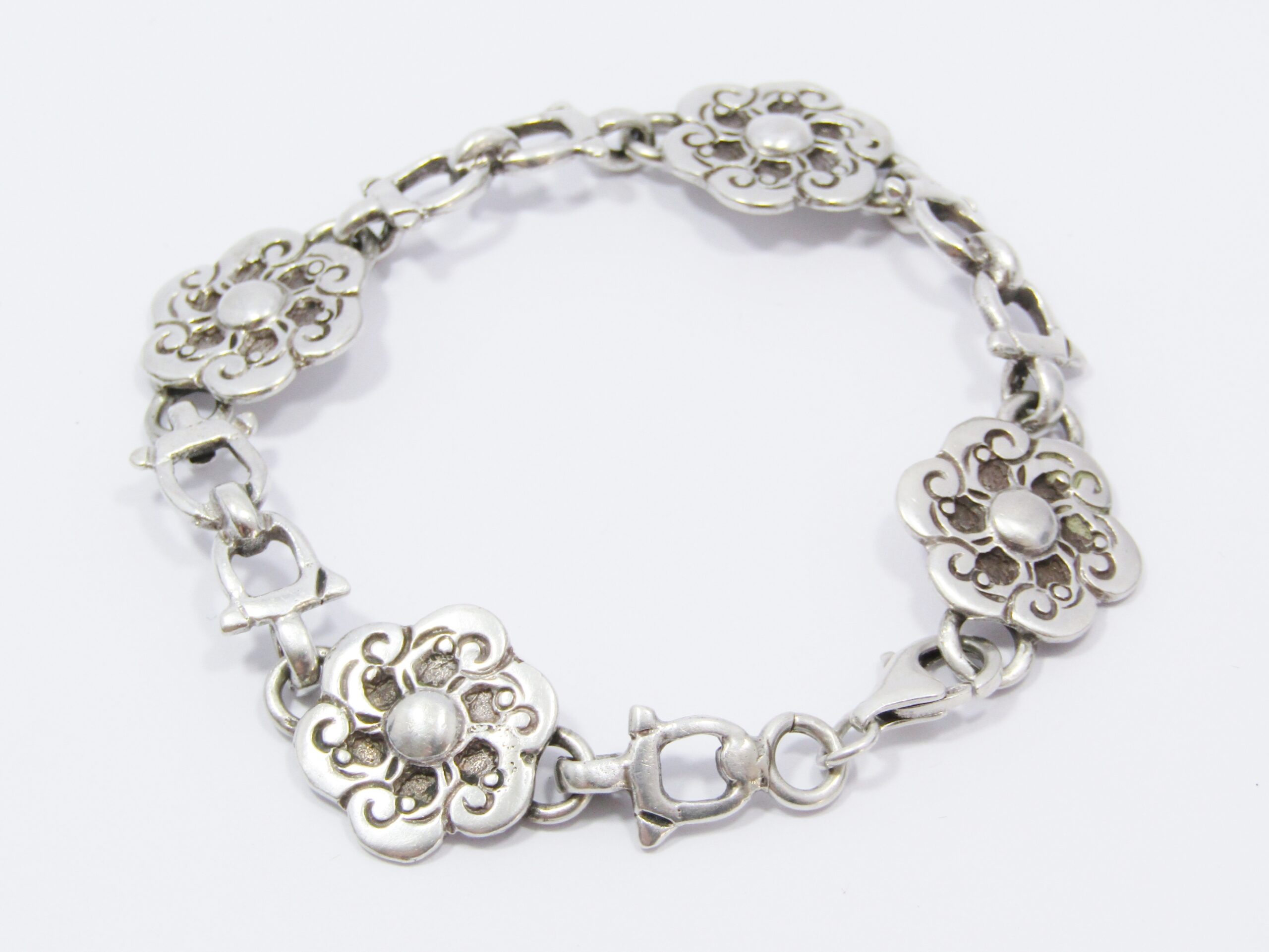A Gorgeous Weighty Flower Bracelet in Sterling Silver.