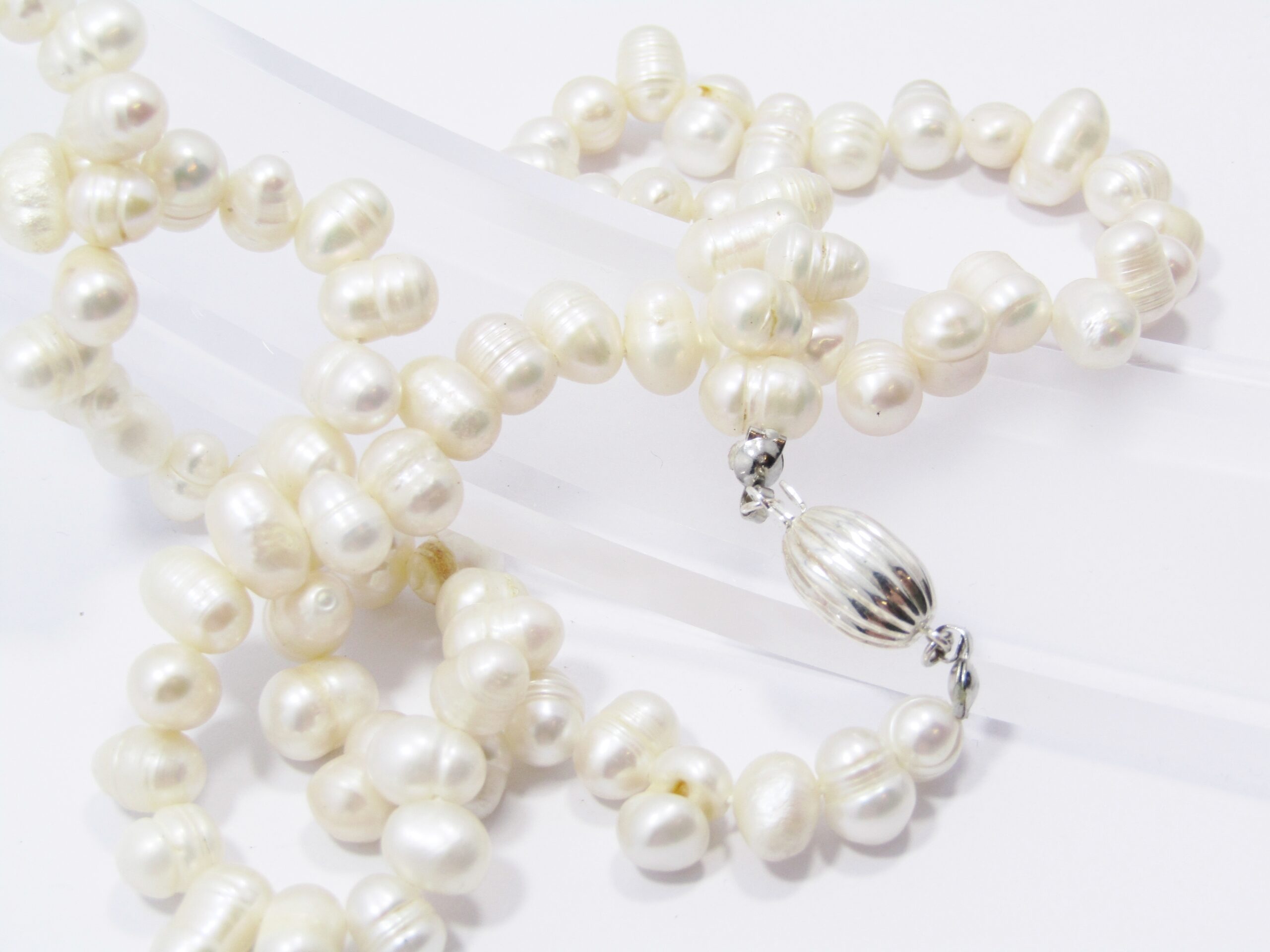 A Gorgeous String of Fresh Water Pearls With a Sterling Silver Clasp