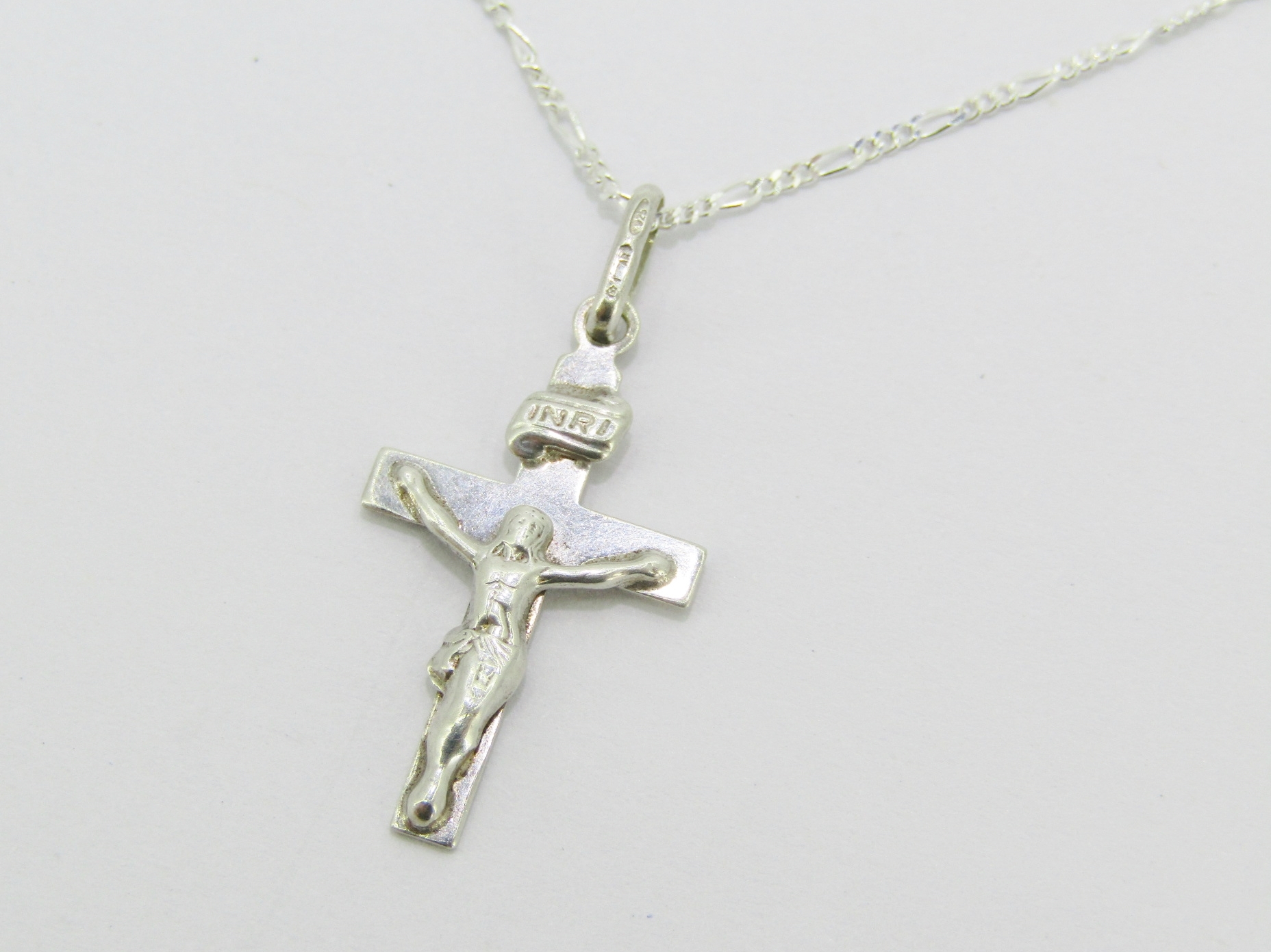 A Beautiful Dainty Crucifix Pendant On Chain in Sterling Silver.