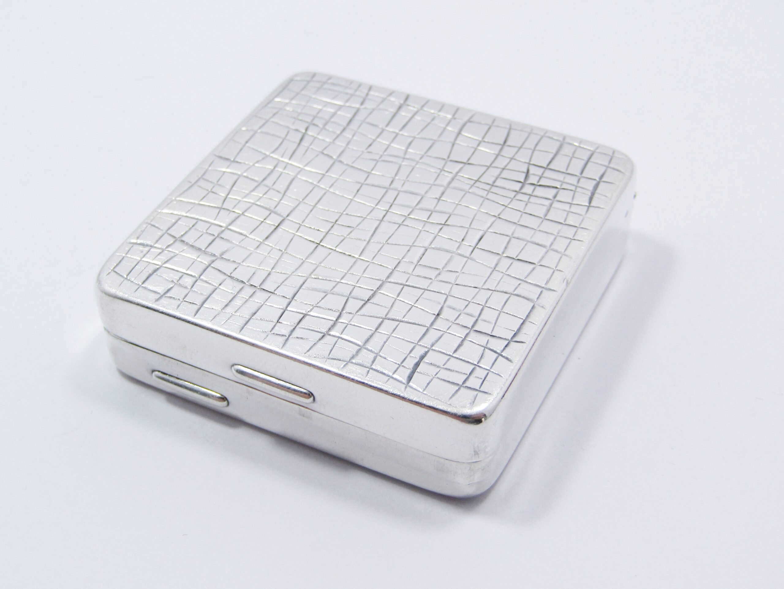 A Beautiful Textured Dutch Square Pill Box in Sterling Silver