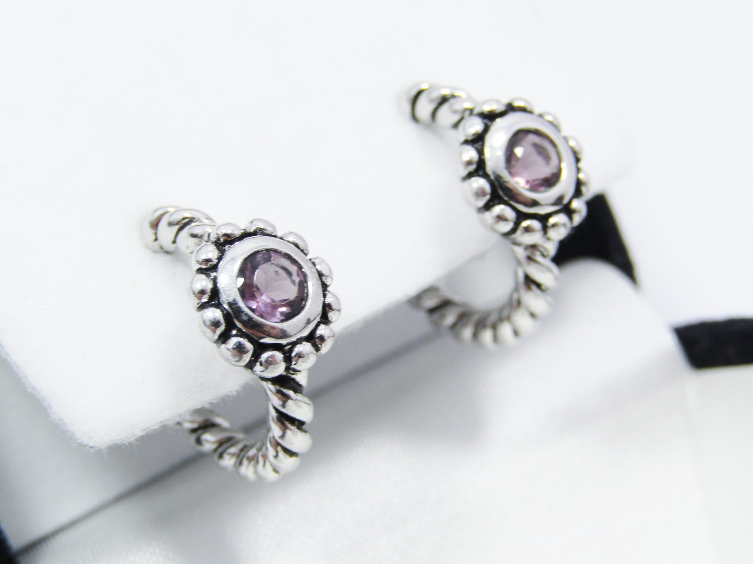 A Lovely Pair of Rope Design Earrings with an Amethyst Stone in Sterling Silver.