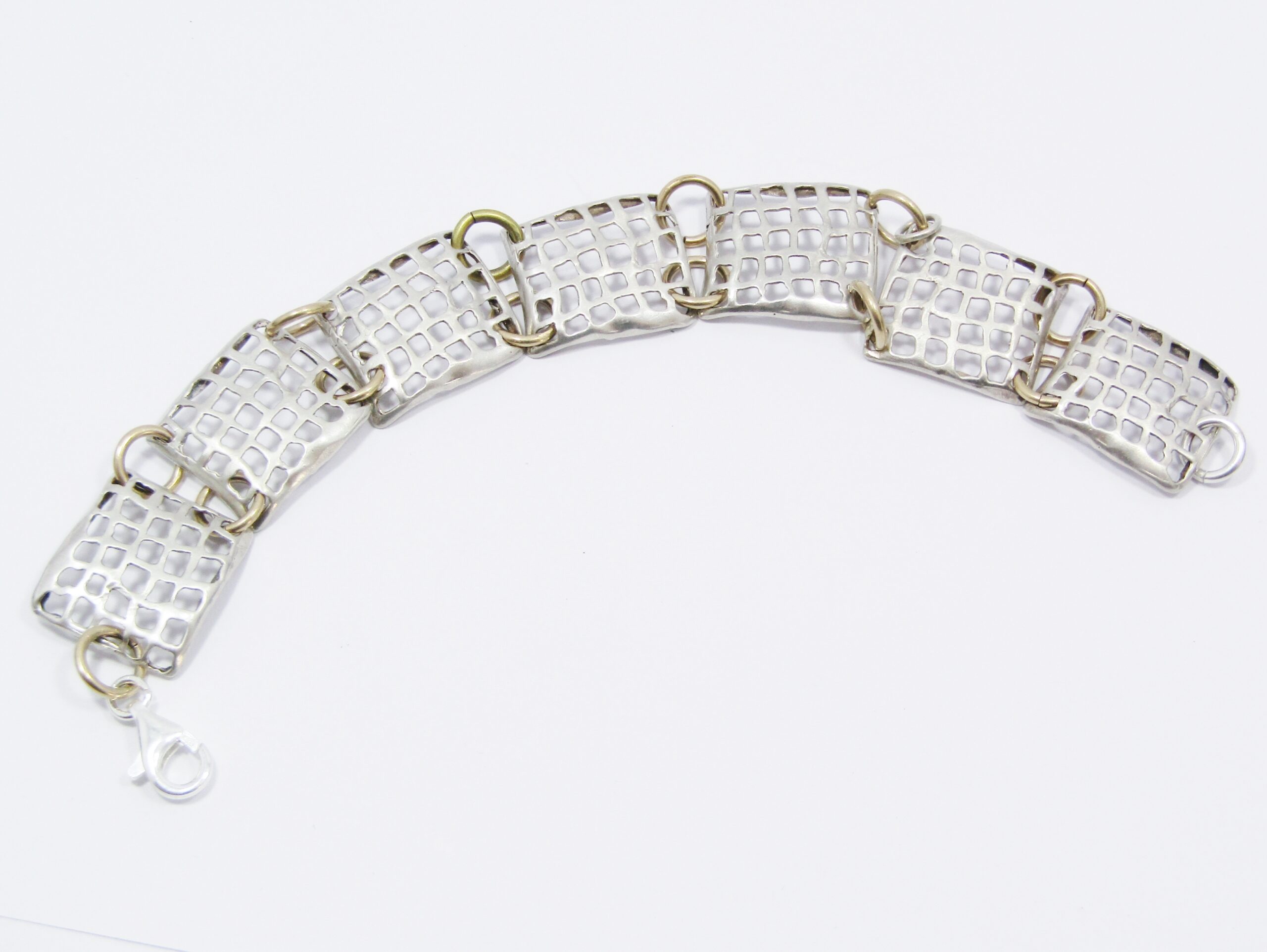 A Lovely Broad Two Tone Mesh Design Bracelet in Sterling Silver.