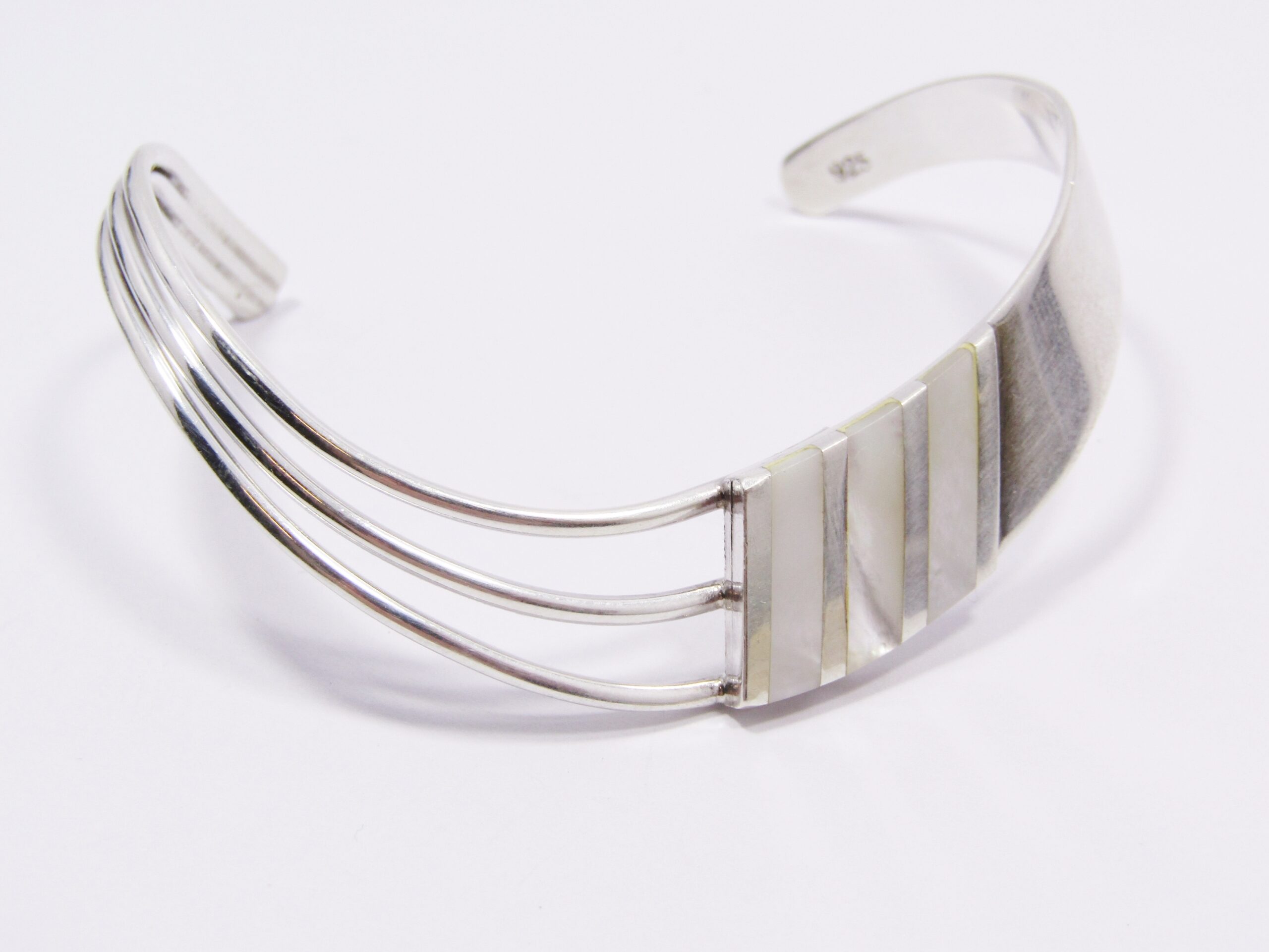 A Stunning Fancy Design Cuff Bangle With a Mother of Pearl Inlay in Sterling Silver.