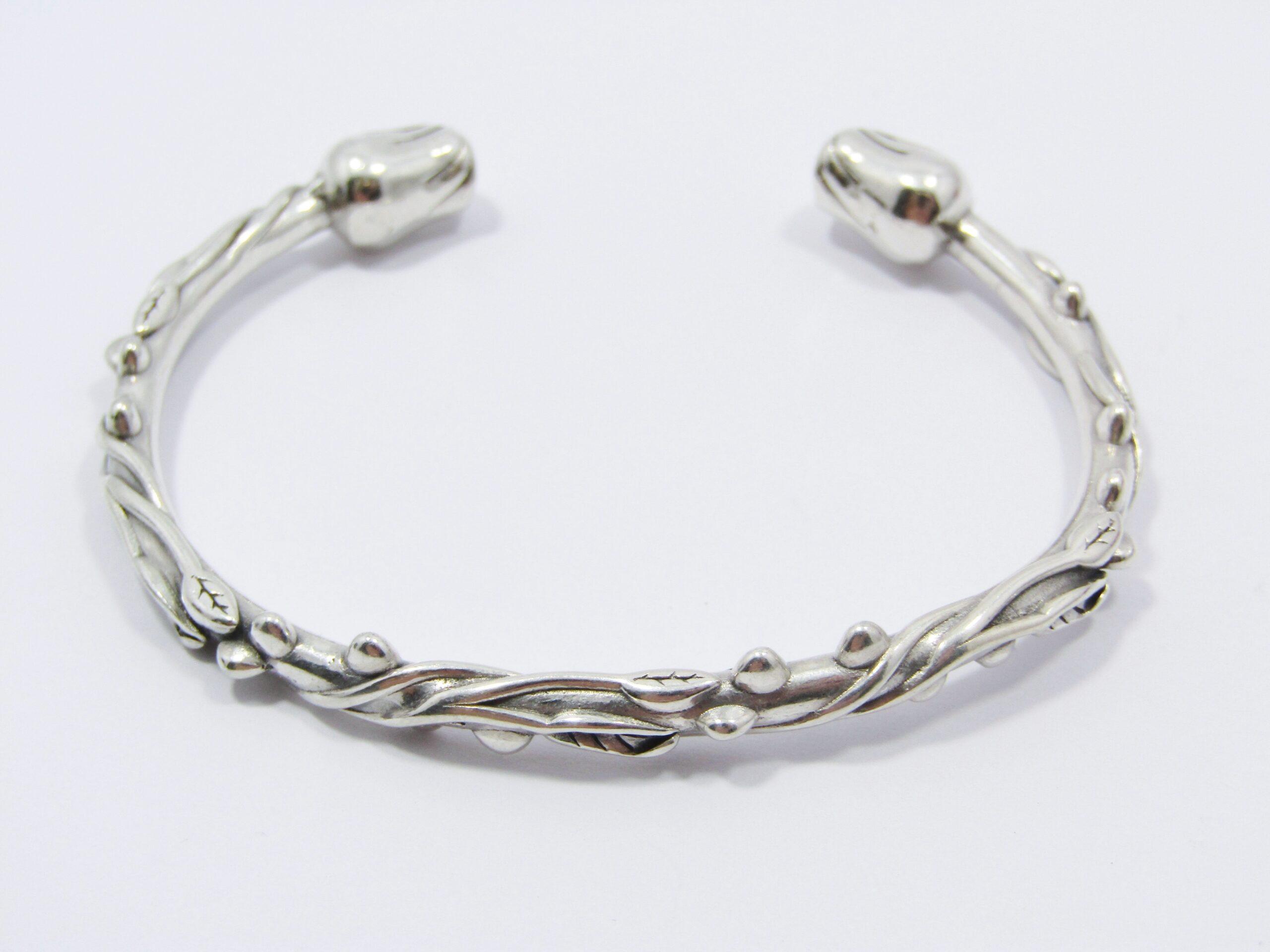 A Gorgeous Bespoke Cuff Bangle Depicting Two Stems of Roses in Sterling Silver