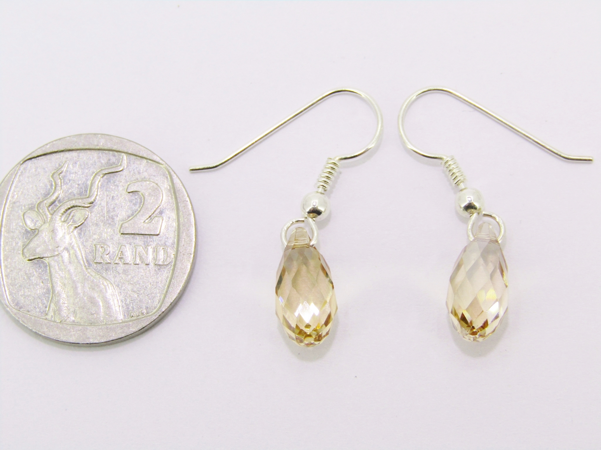 A Beautiful Pair of Champaign Color Swarovski Crystals Drop Earrings in Sterling Silver.