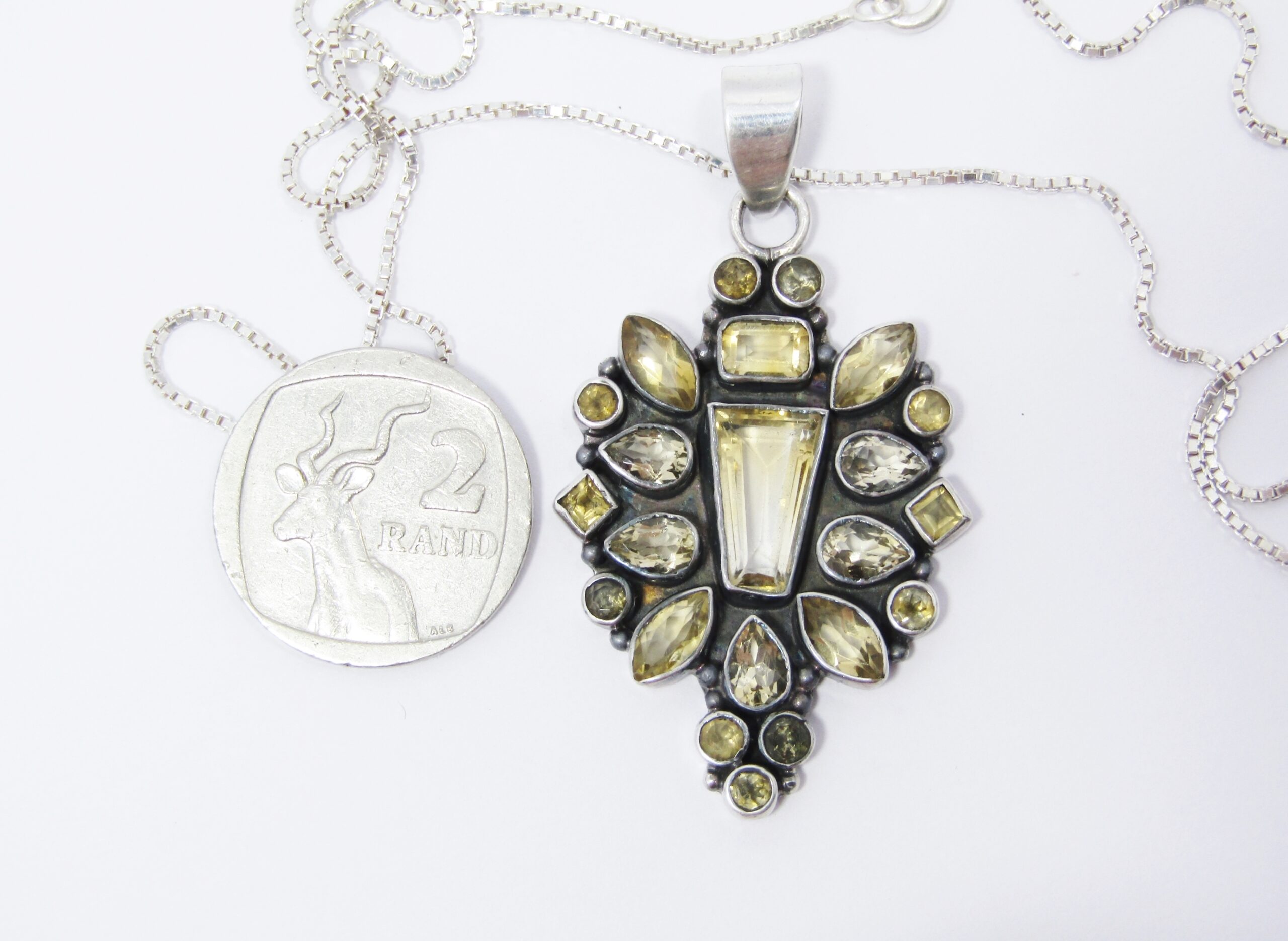 A Stunning Huge Citrine Gemstone Pendant on Chain in Sterling Silver.