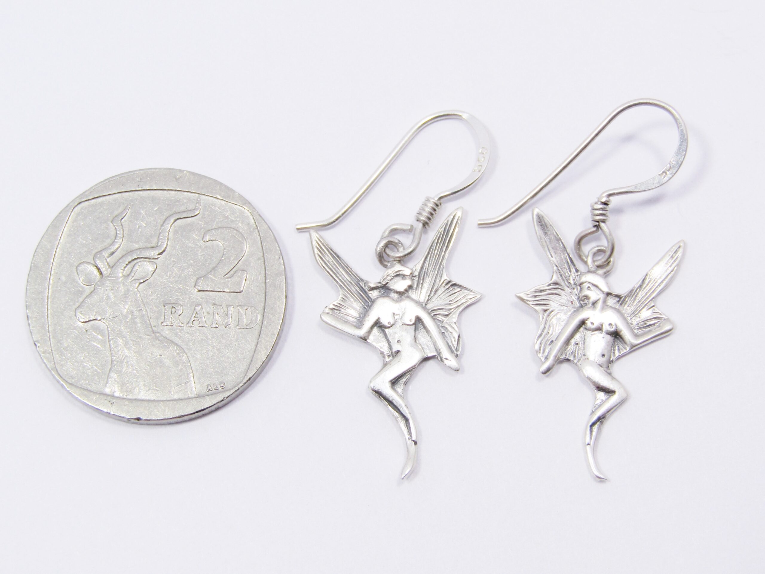 A Gorgeous Pair of Fairy Design Earrings in Sterling Silver.