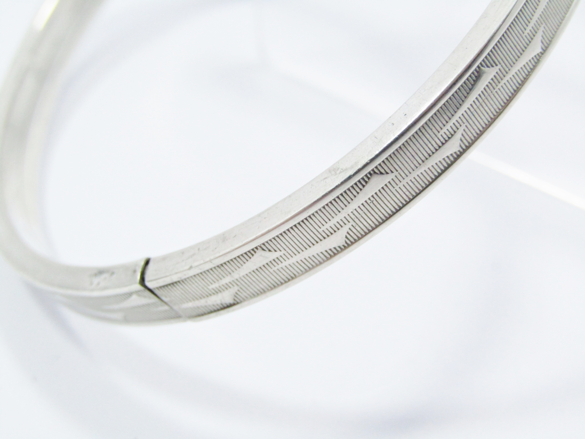 A lovely Textured Twist to Open Bangle in Sterling Silver