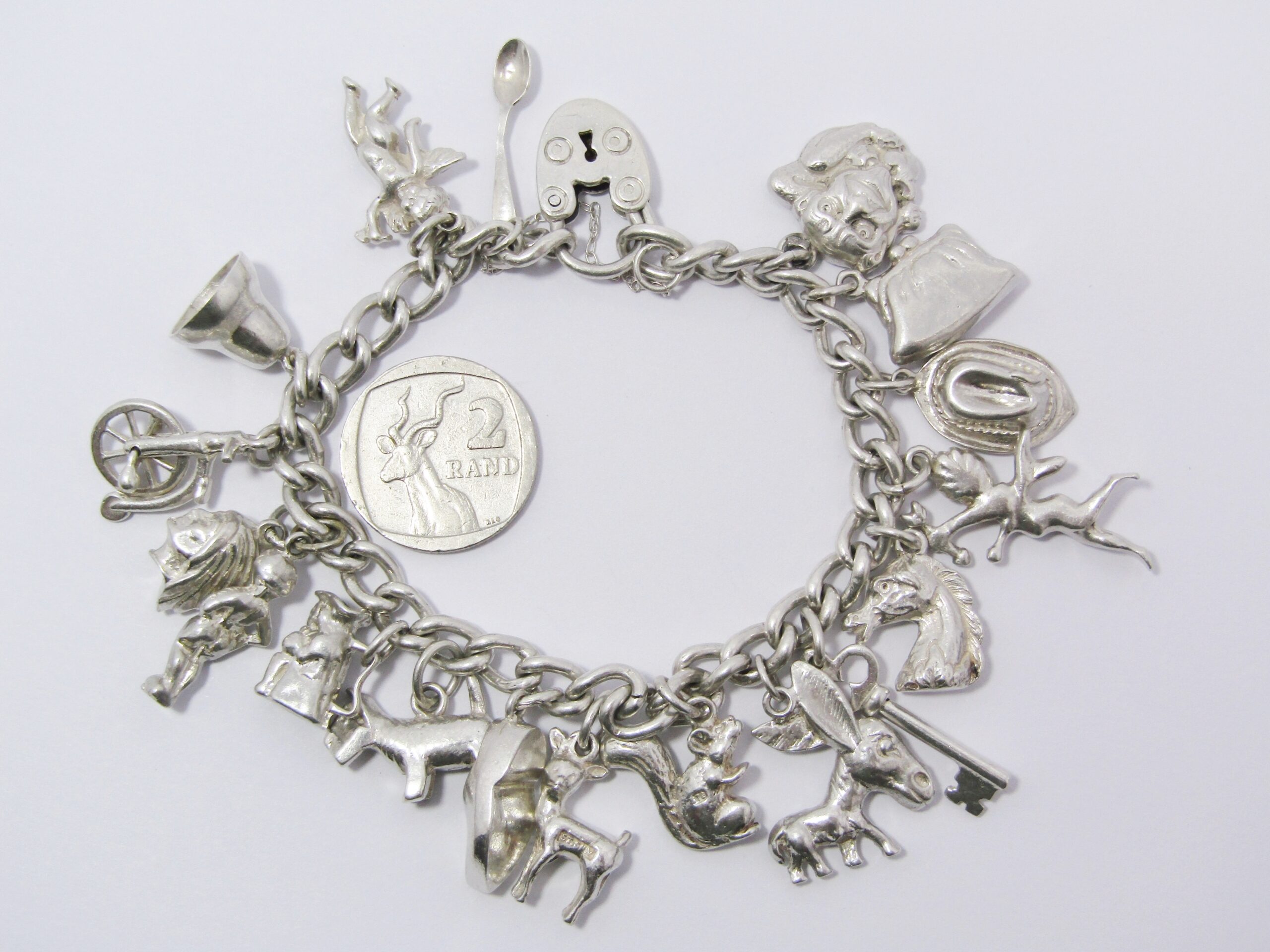 A Gorgeous Vintage Chunky Charm Bracelet in Sterling Silver