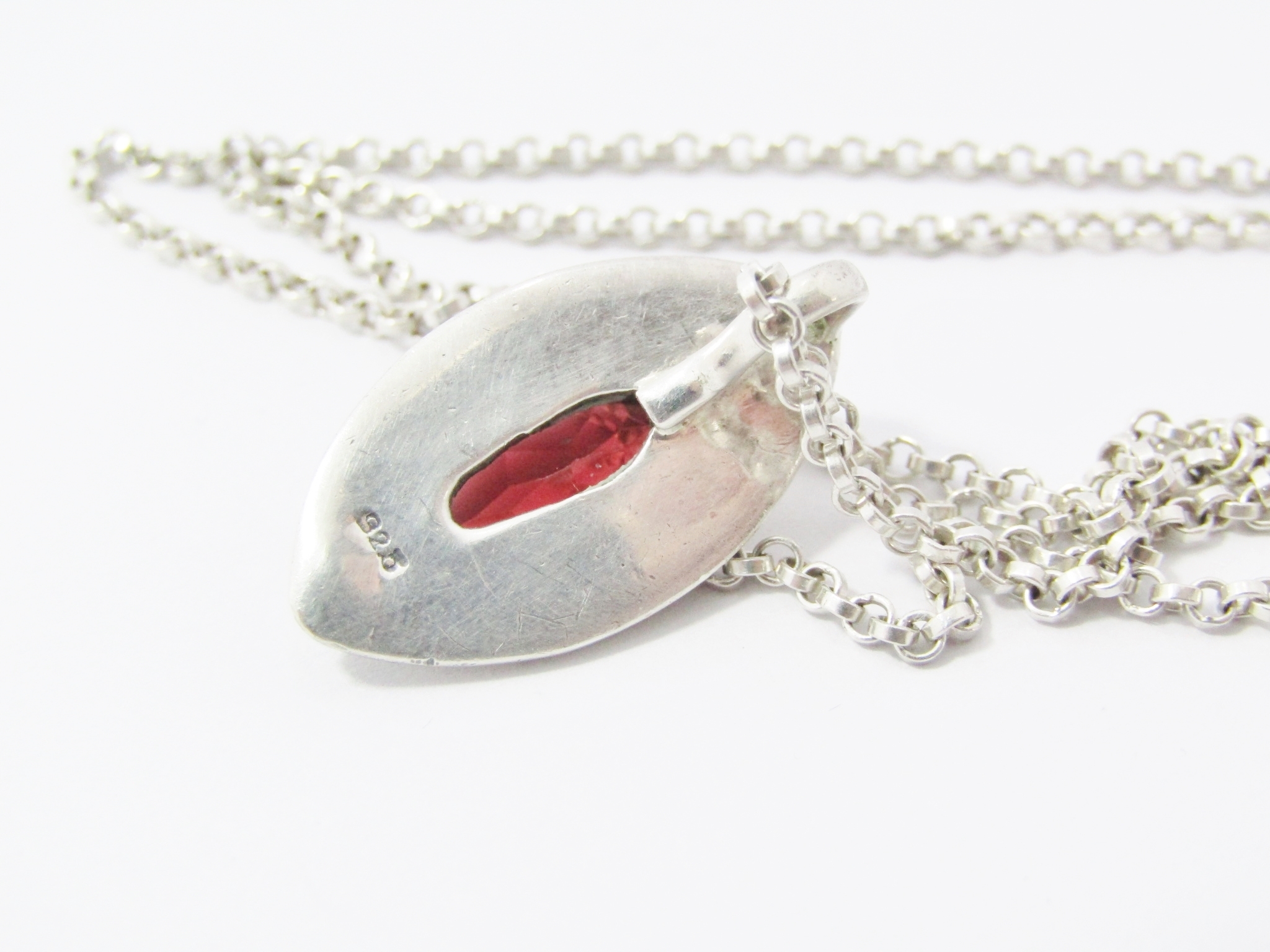 Stunning Two Tone Bronze And Silver Pendant With a Garnet On Chain in Sterling Silver.