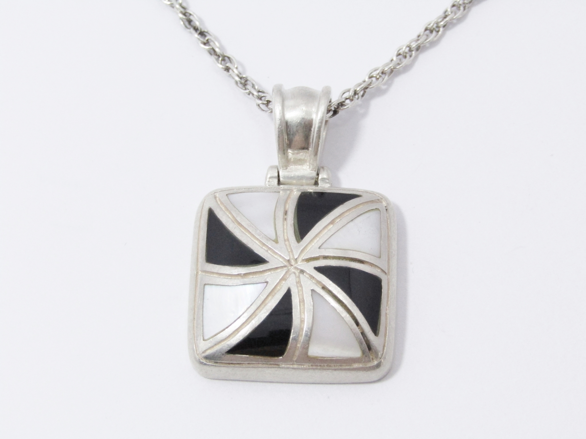 A Gorgeous Square Mother of Pearl and Black inlay Pendant On Chain in Sterling Silver.