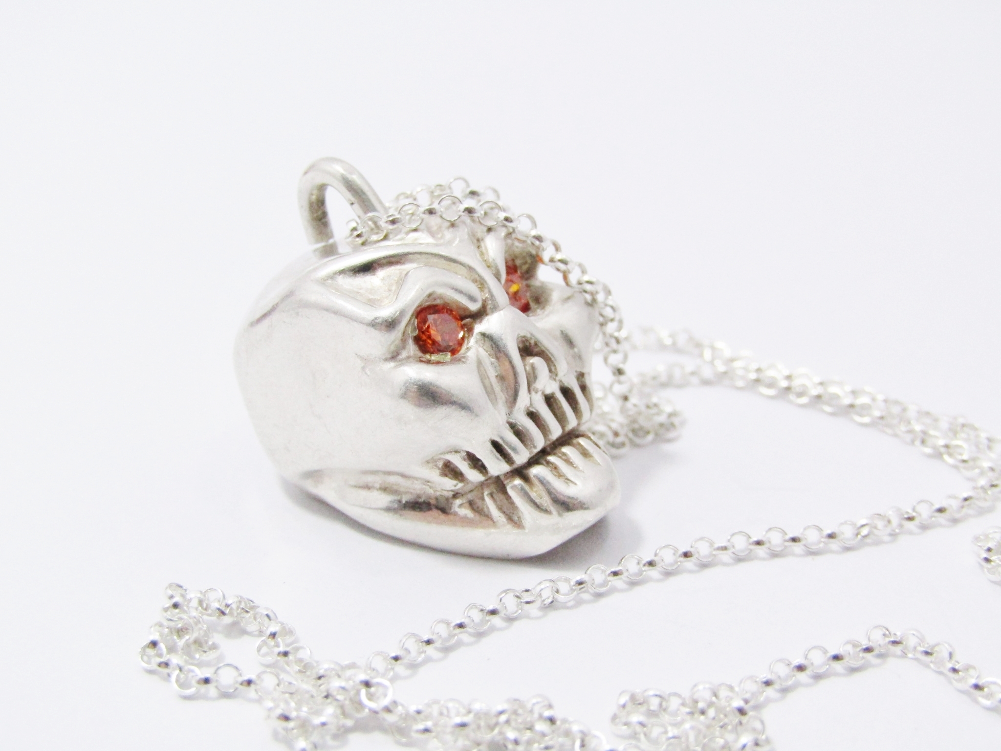 A Stunning Skull Pendant With Zirconia Eyes On Chain in Sterling Silver