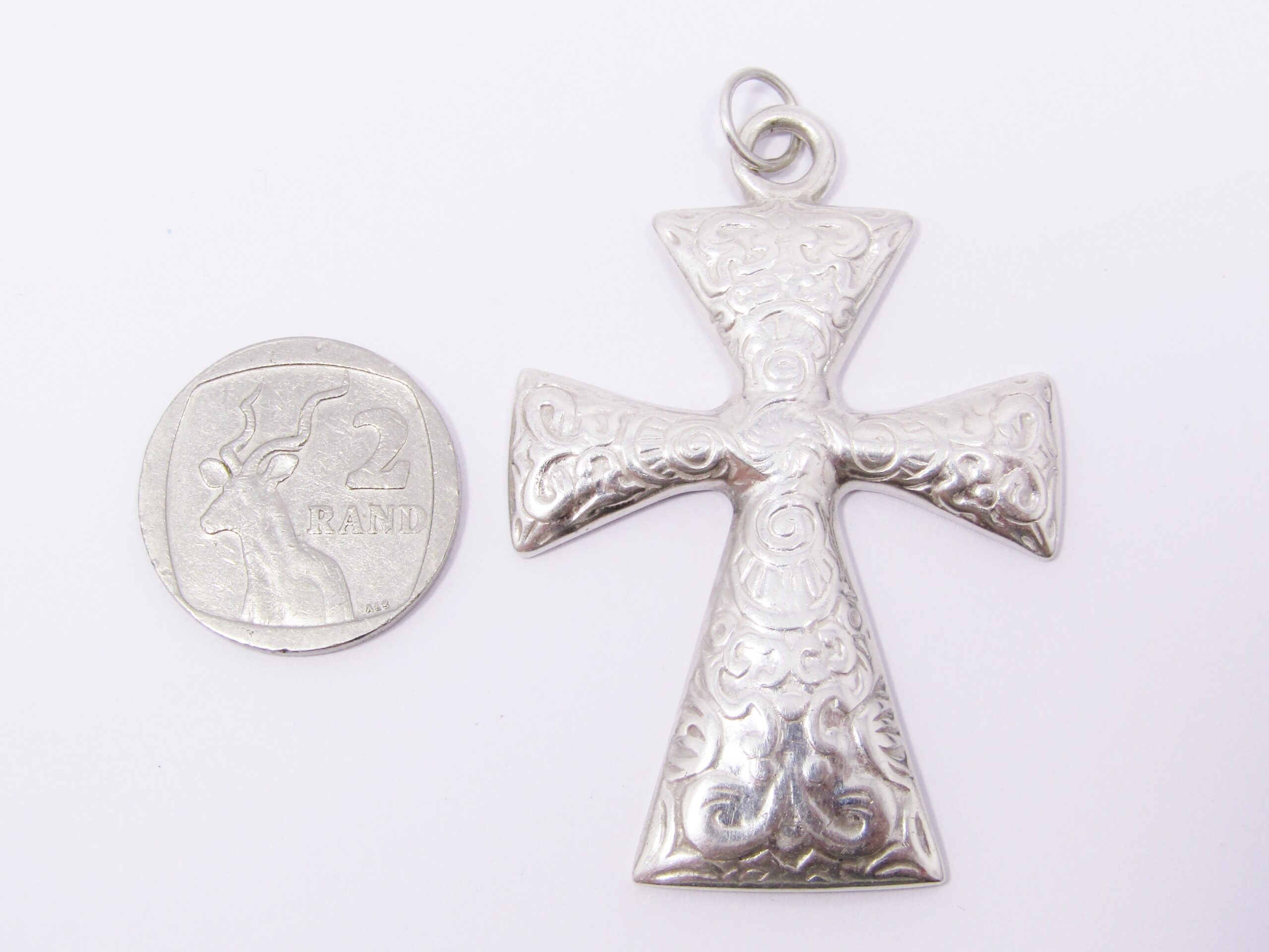 A Gorgeous Large Patterned Design Cross in Sterling Silver.