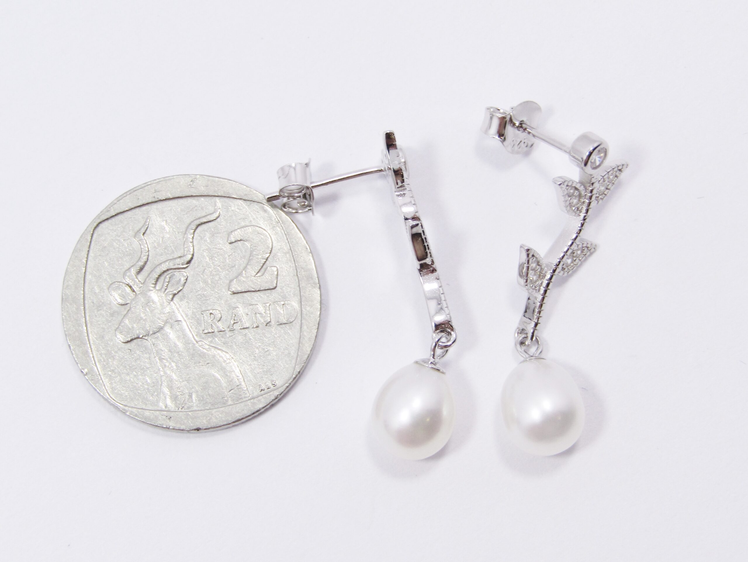 A Pair of Fresh Water Dangling Earrings with Tiny Clear Crystals for Sparkle in Sterling Silver