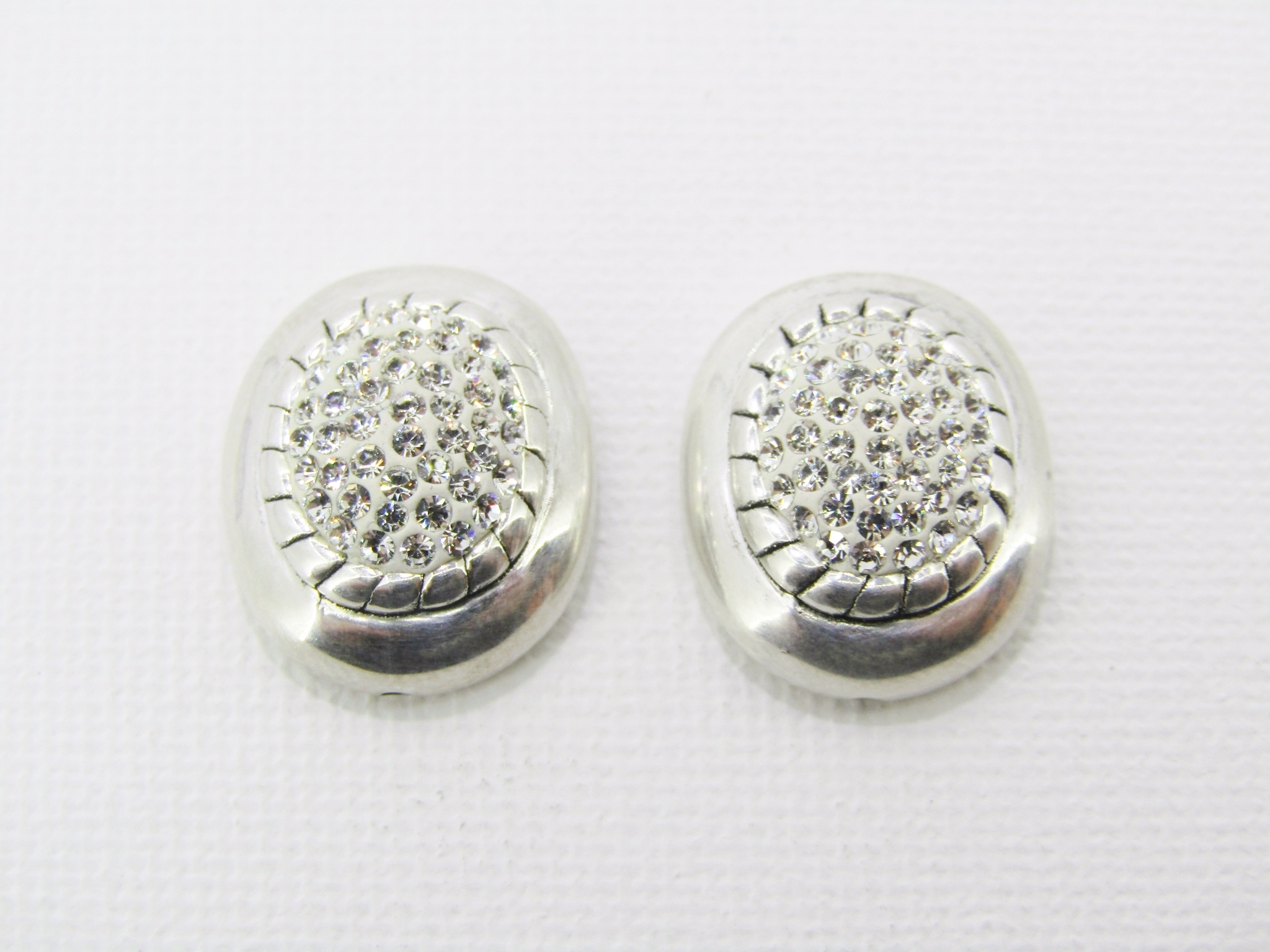 A Beautiful Pair of Oval Zirconia Earrings in Sterling Silver.