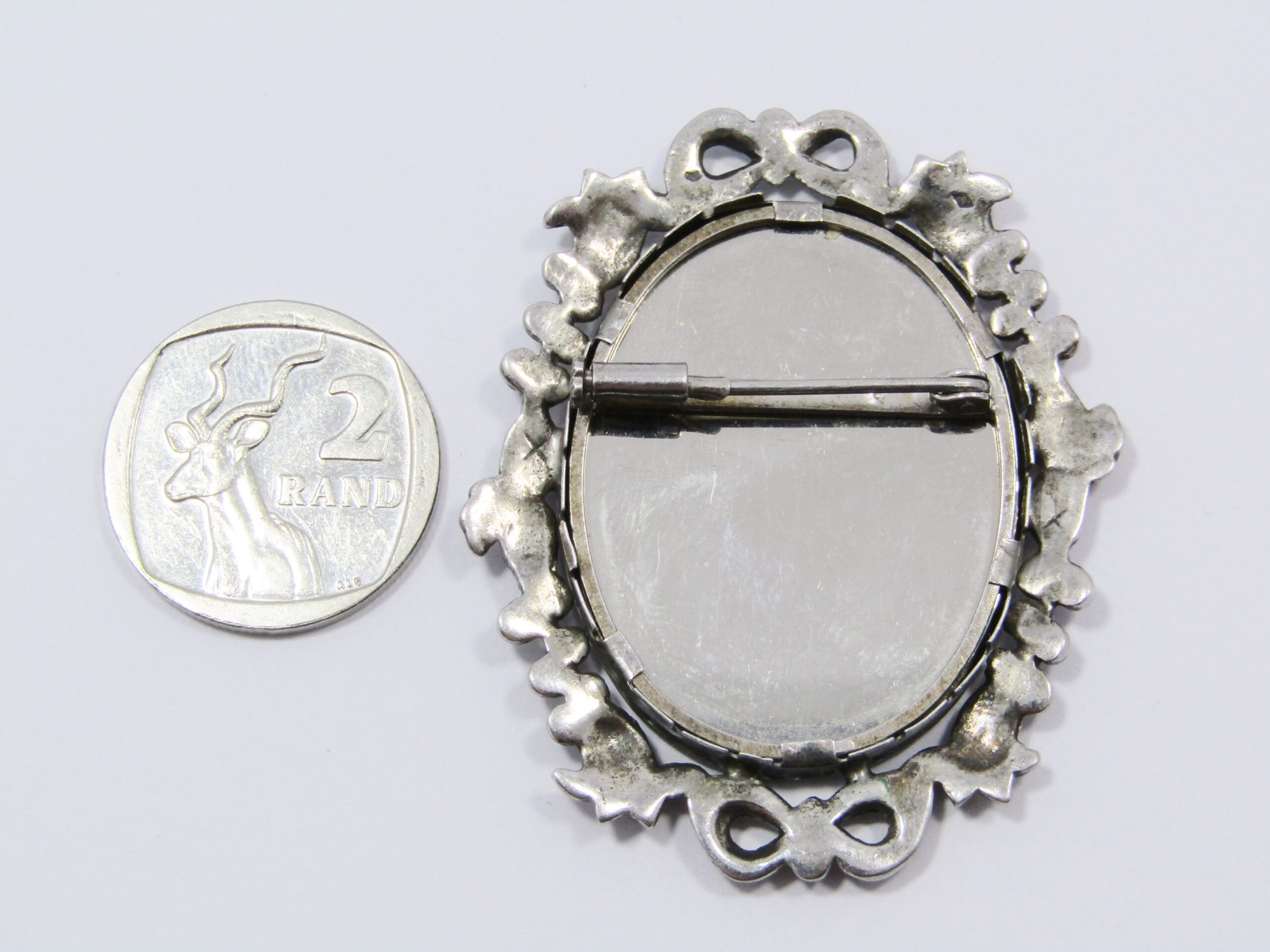 A Gorgeous Hand Painted Vintage Design Self Portrait Brooch In Silver