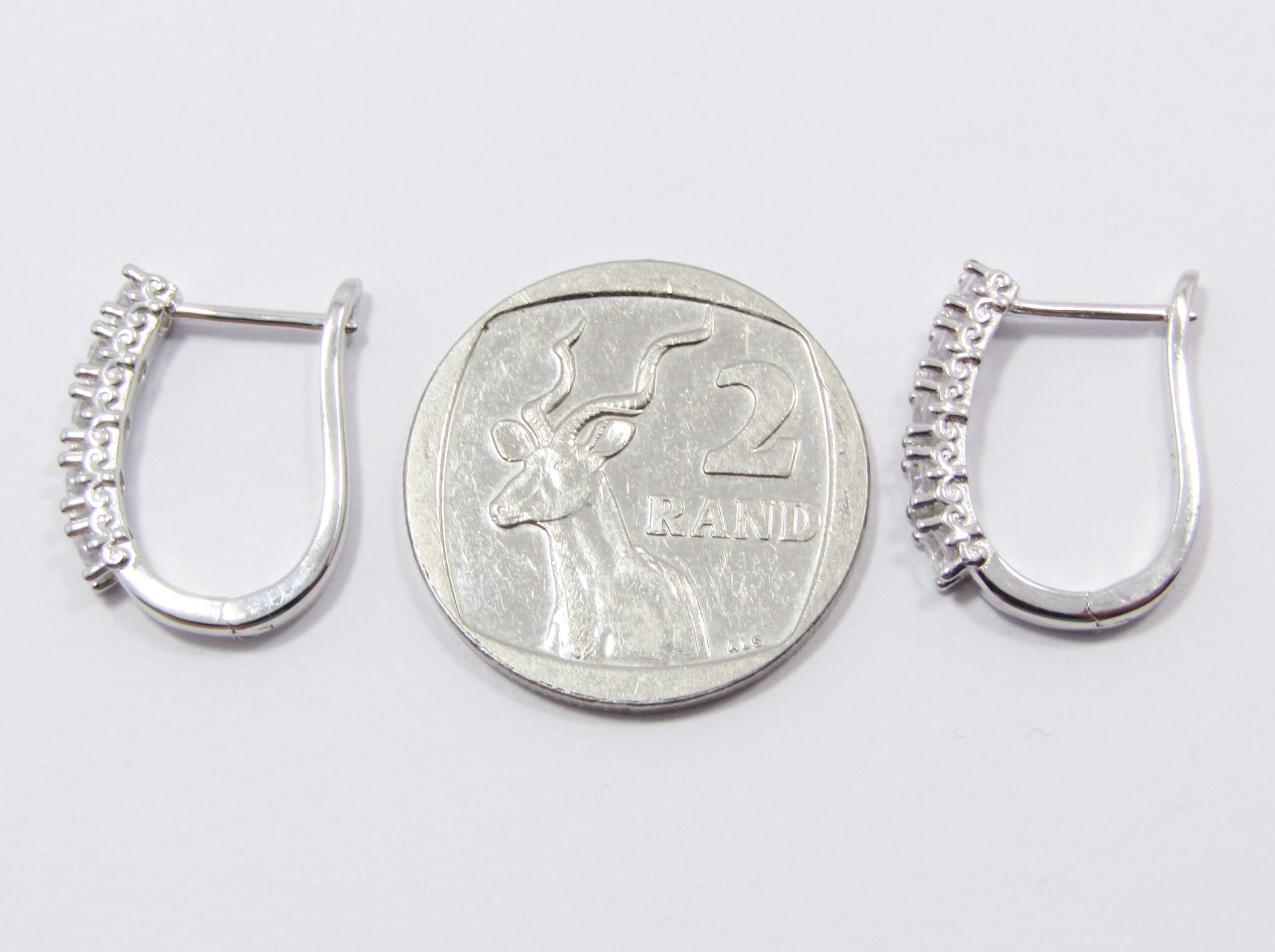 A Lovely Pair of Zirconia Stud Earrings in Sterling Silver.