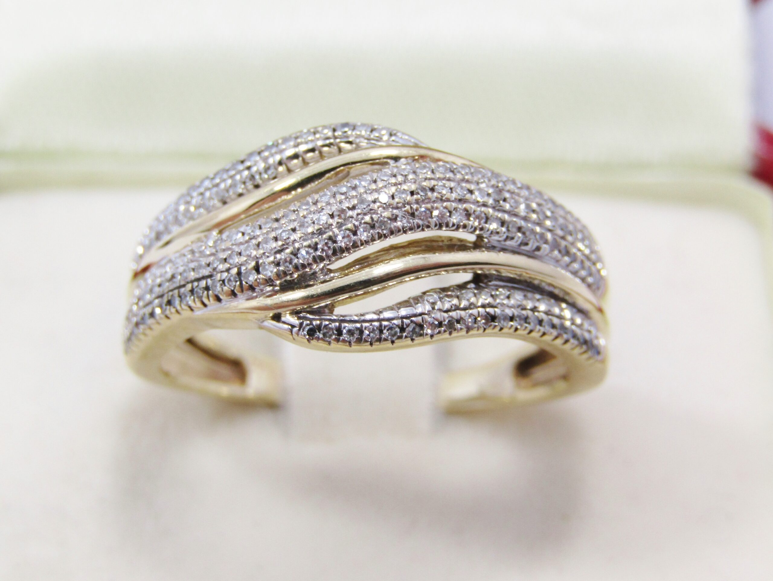 Beautiful Wavy Design 9CT Gold Ring with Diamonds