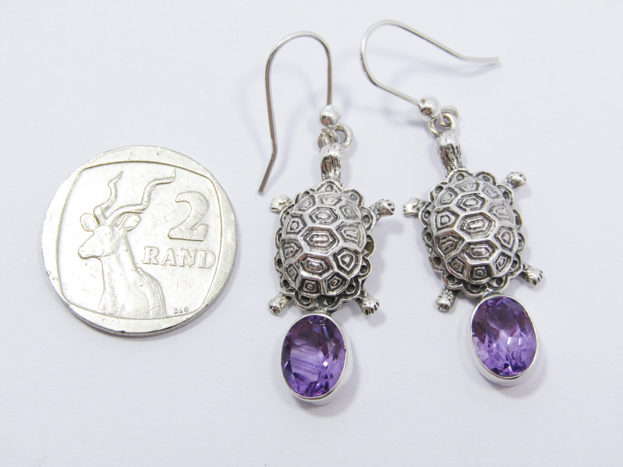 A Gorgeous Pair of Turtle Earrings With Amethyst Gemstones in Sterling Silver.