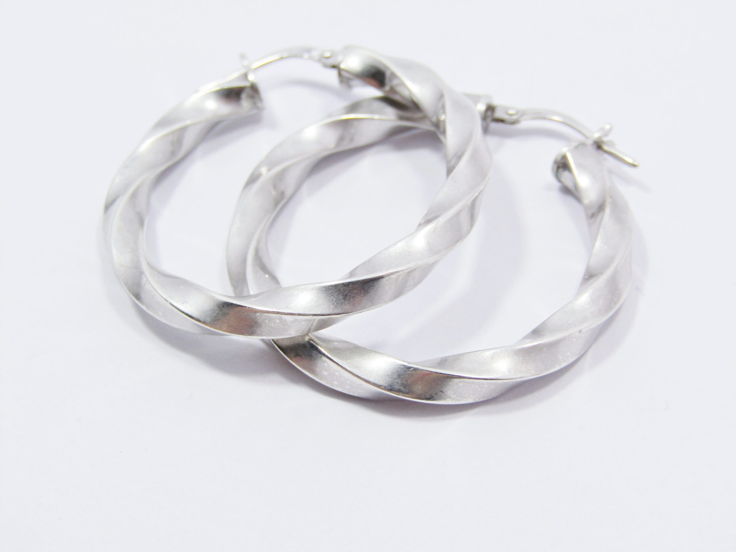 A Gorgeous Pair of Twisted Gypsy Design Earrings in Sterling Silver.