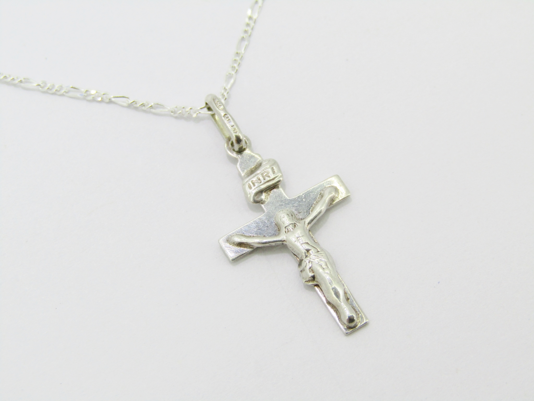 A Beautiful Dainty Crucifix Pendant On Chain in Sterling Silver.