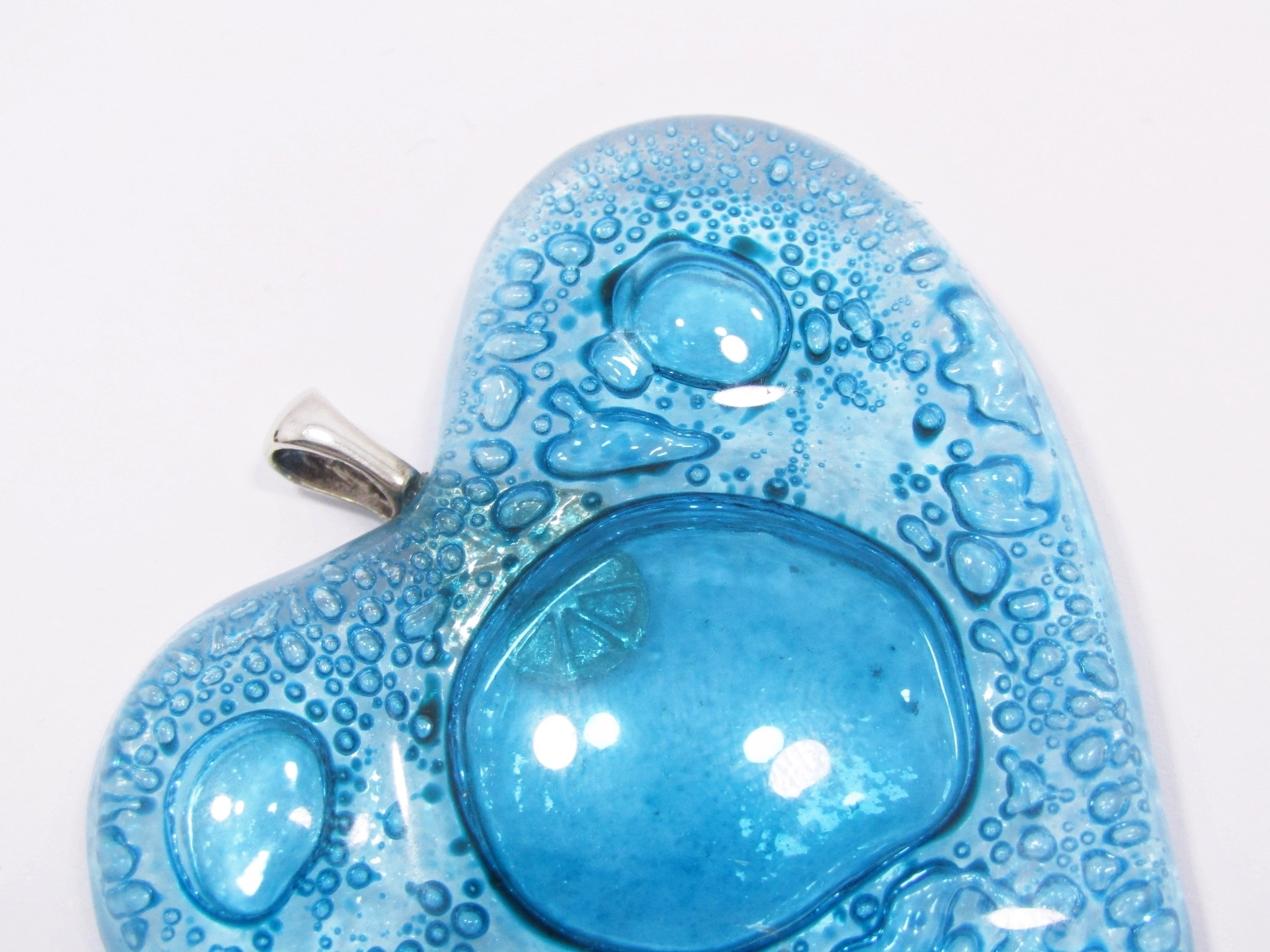 A Magnificent Huge Sea Blue Glass Heart Pendant With a Sterling Silver Bail