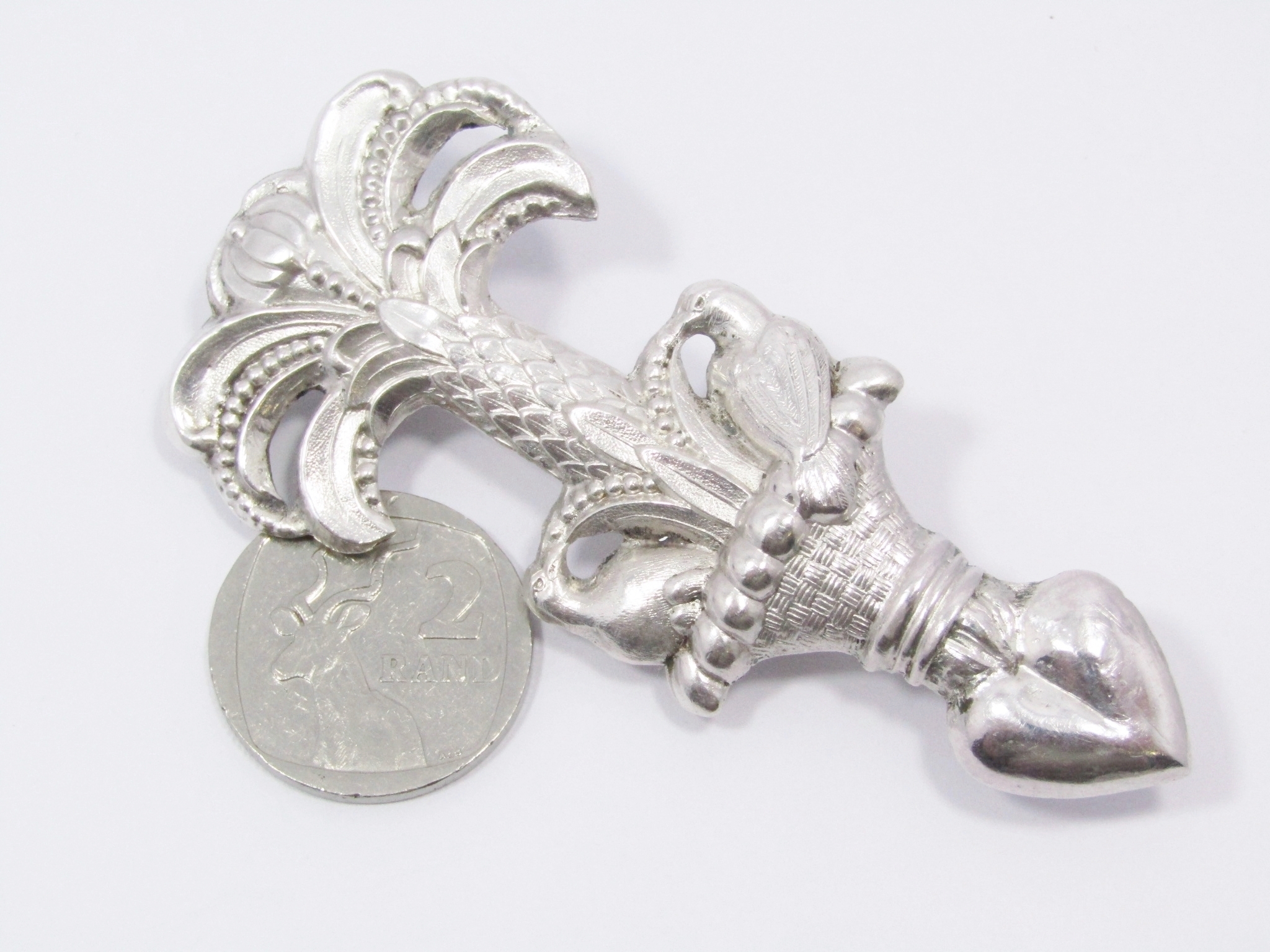 An Amazing Detailed Antique Brooch in Sterling Silver.