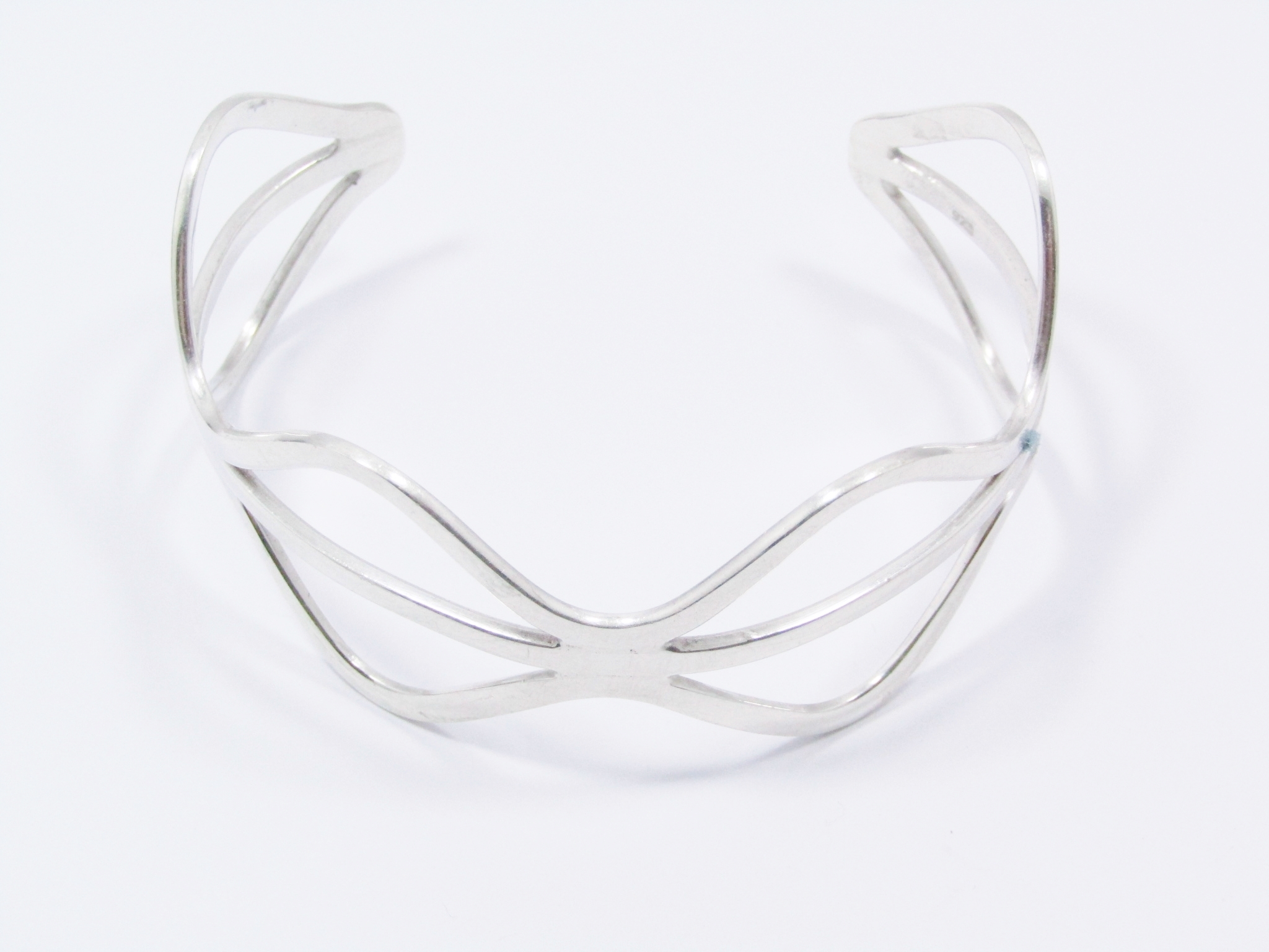 A Lovely Broad Fancy Design Cuff Bangle in Sterling Silver.