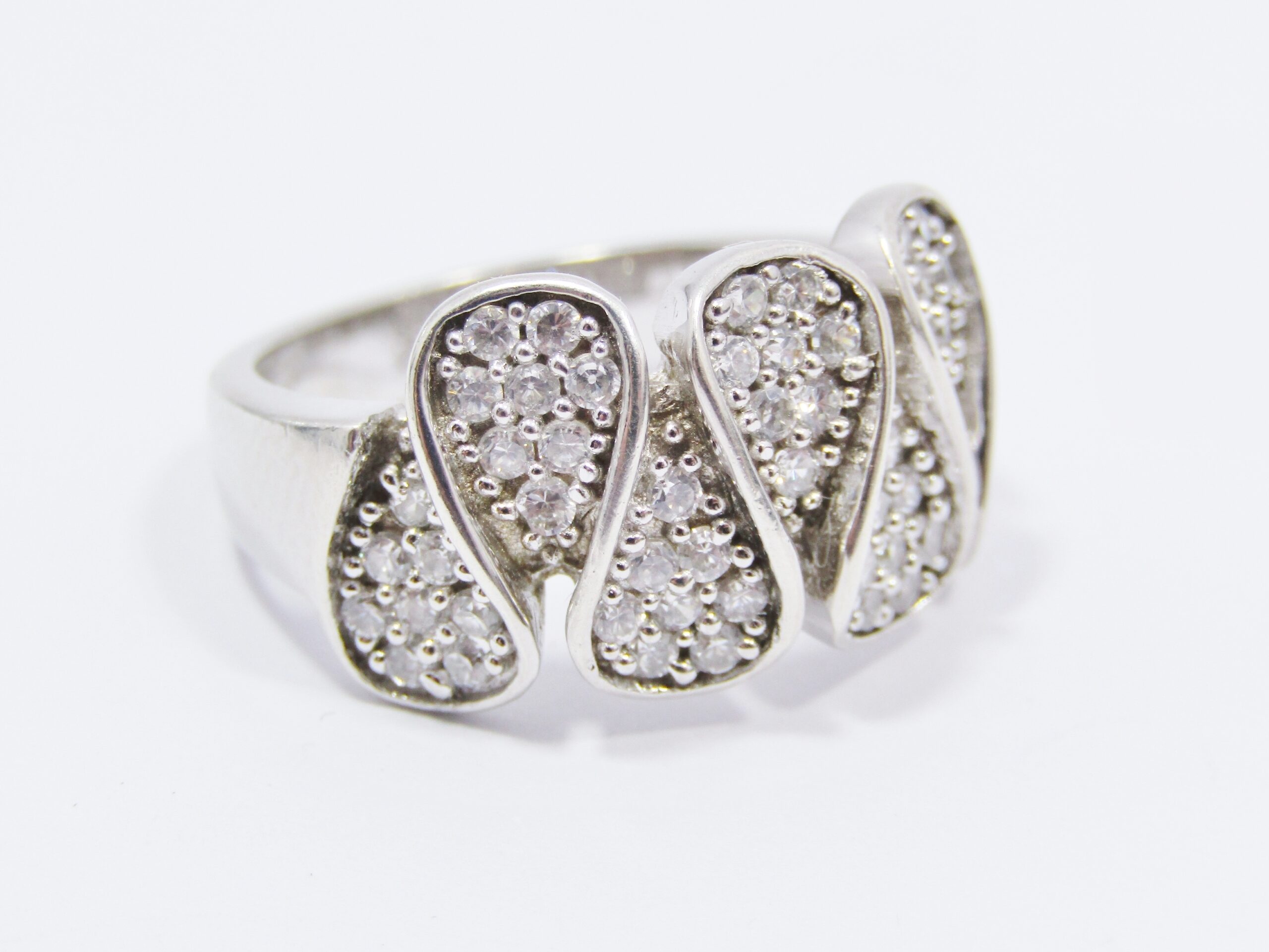 A Gorgeous Swirl Design Ring Encrusted with Tiny Zirconia’s in Sterling Silver