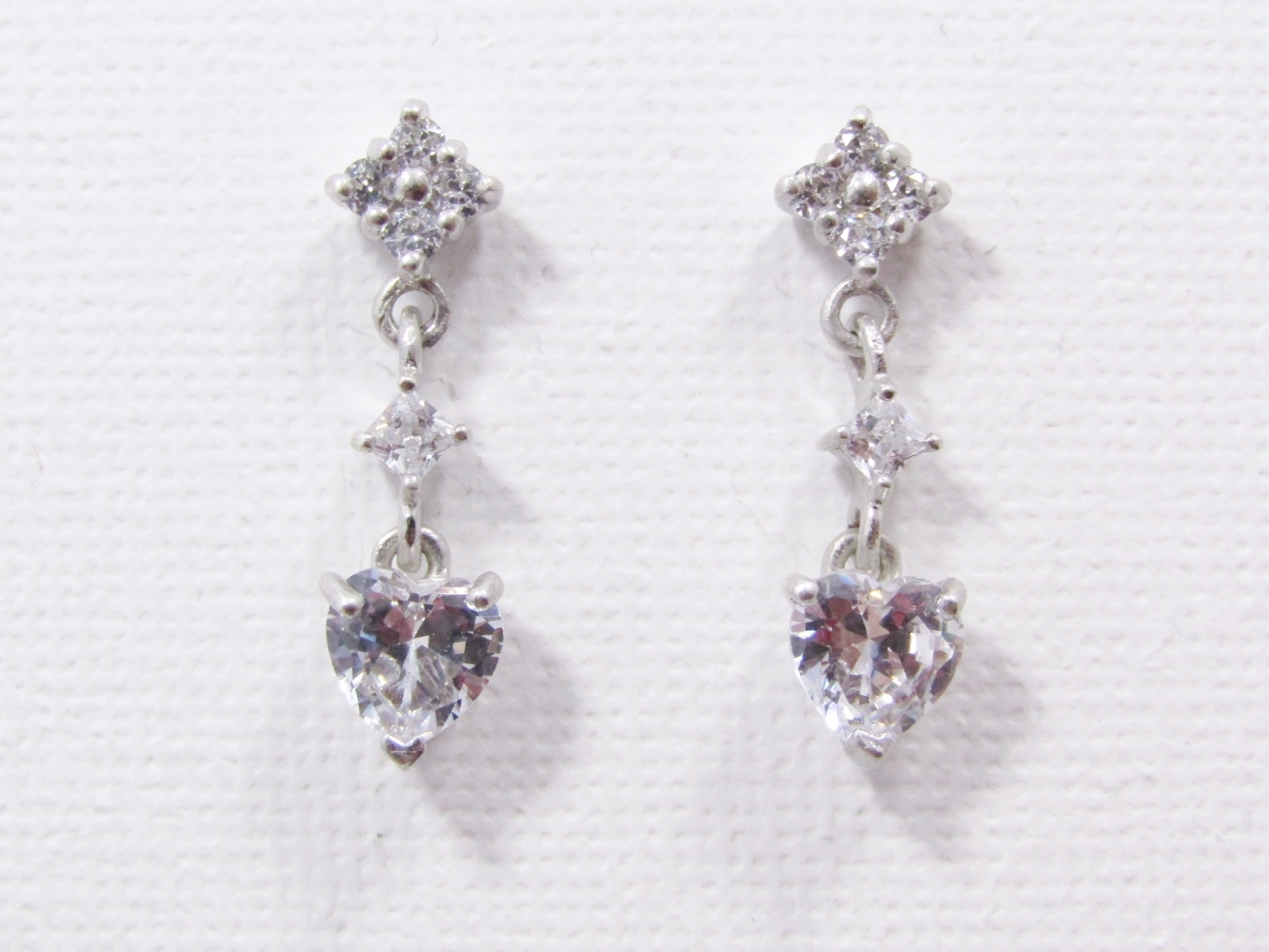 An Elegant Pair of Zirconia Heart Drop Earrings