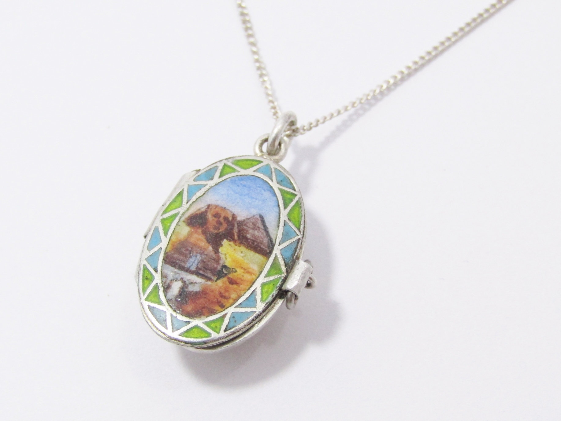 A Beautiful Egyptian Themed Woven Basket Locket Pendant With Enameling on chain in sterling silver