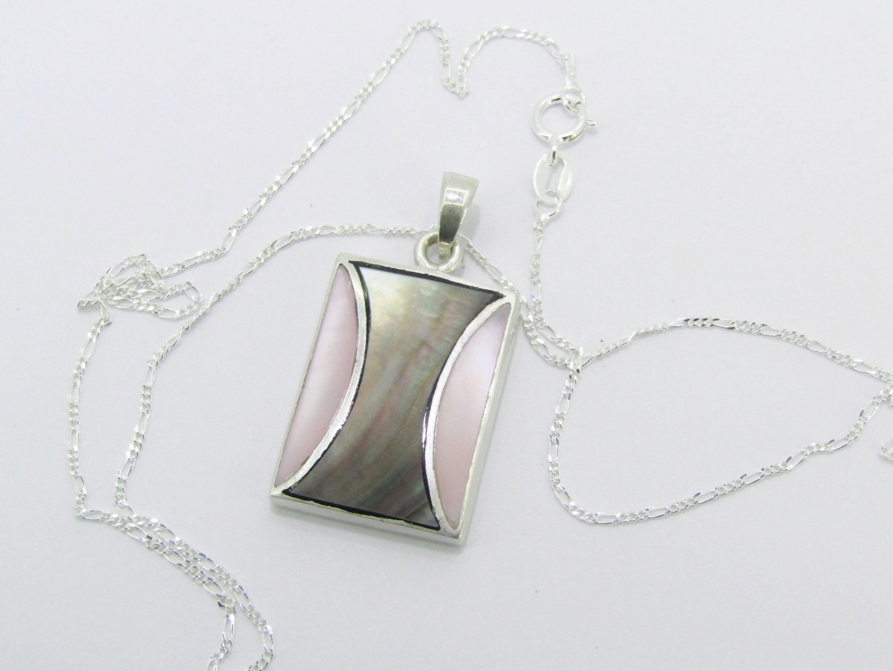 A Lovely Mother of Pearl Pendant on Chain in Sterling Silver.