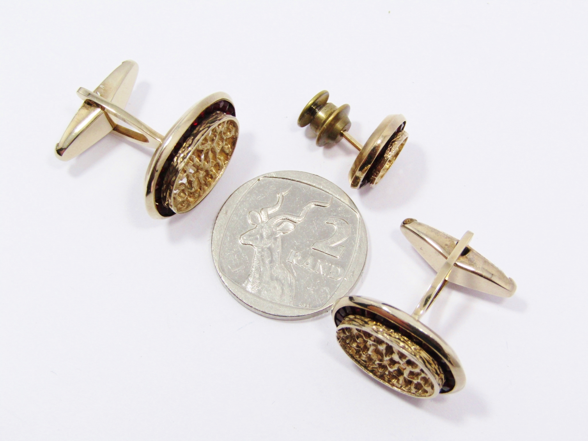A Very Special Set Made up in Cuff links and a Tie Pin in Gold Gilt over Sterling Silver