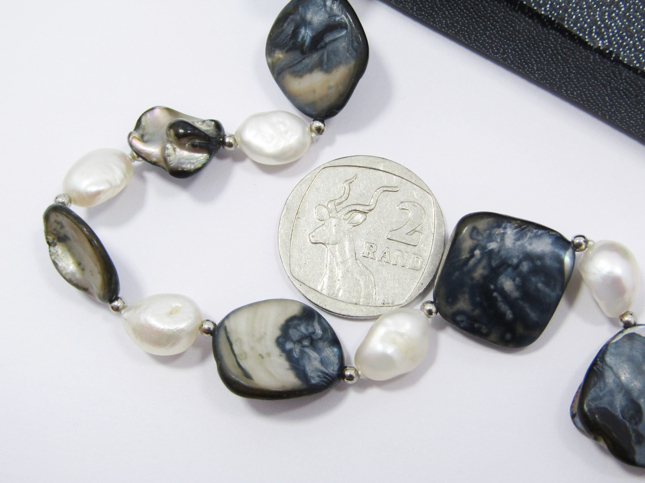 A Gorgeous Baroque Pearls And Mother of Pearl Necklace With a Sterling Silver Clasp