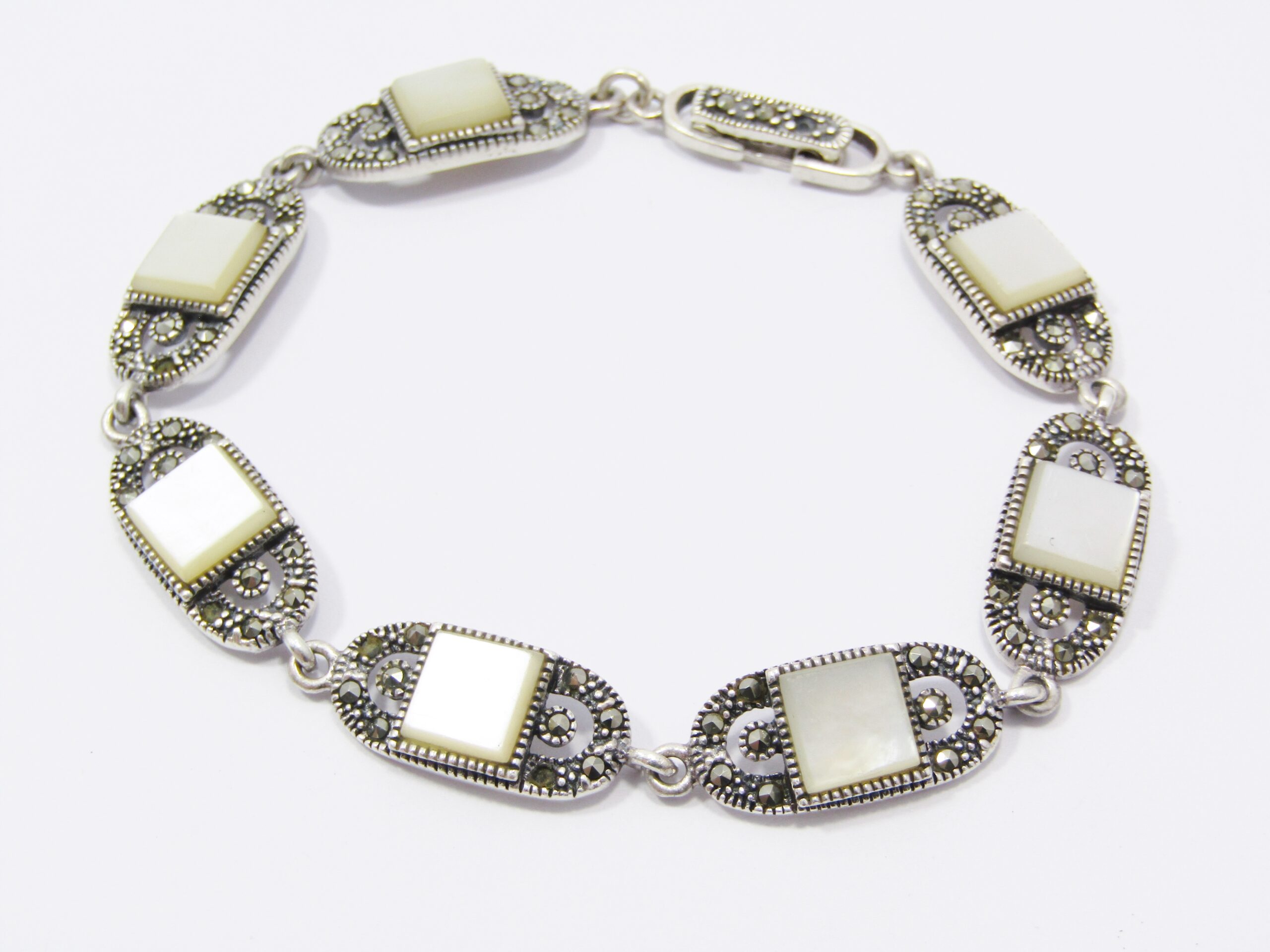 A Lovely Mother of Pearl and Marcasite Bracelet in Sterling Silver.