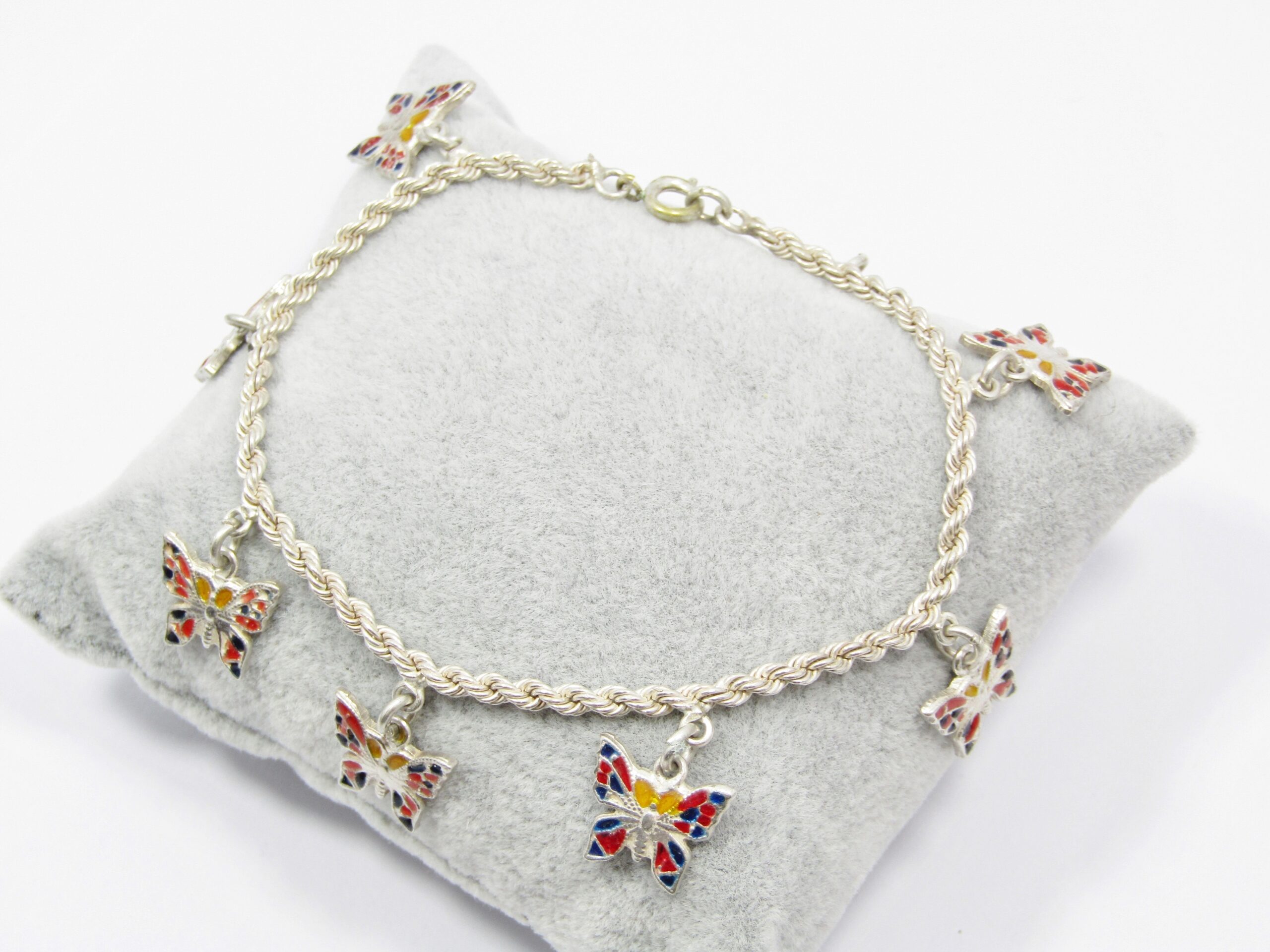 A Beautiful Enamel inlay Butterfly Charm Bracelet With Egyptian Hallmarks for 800 Silver