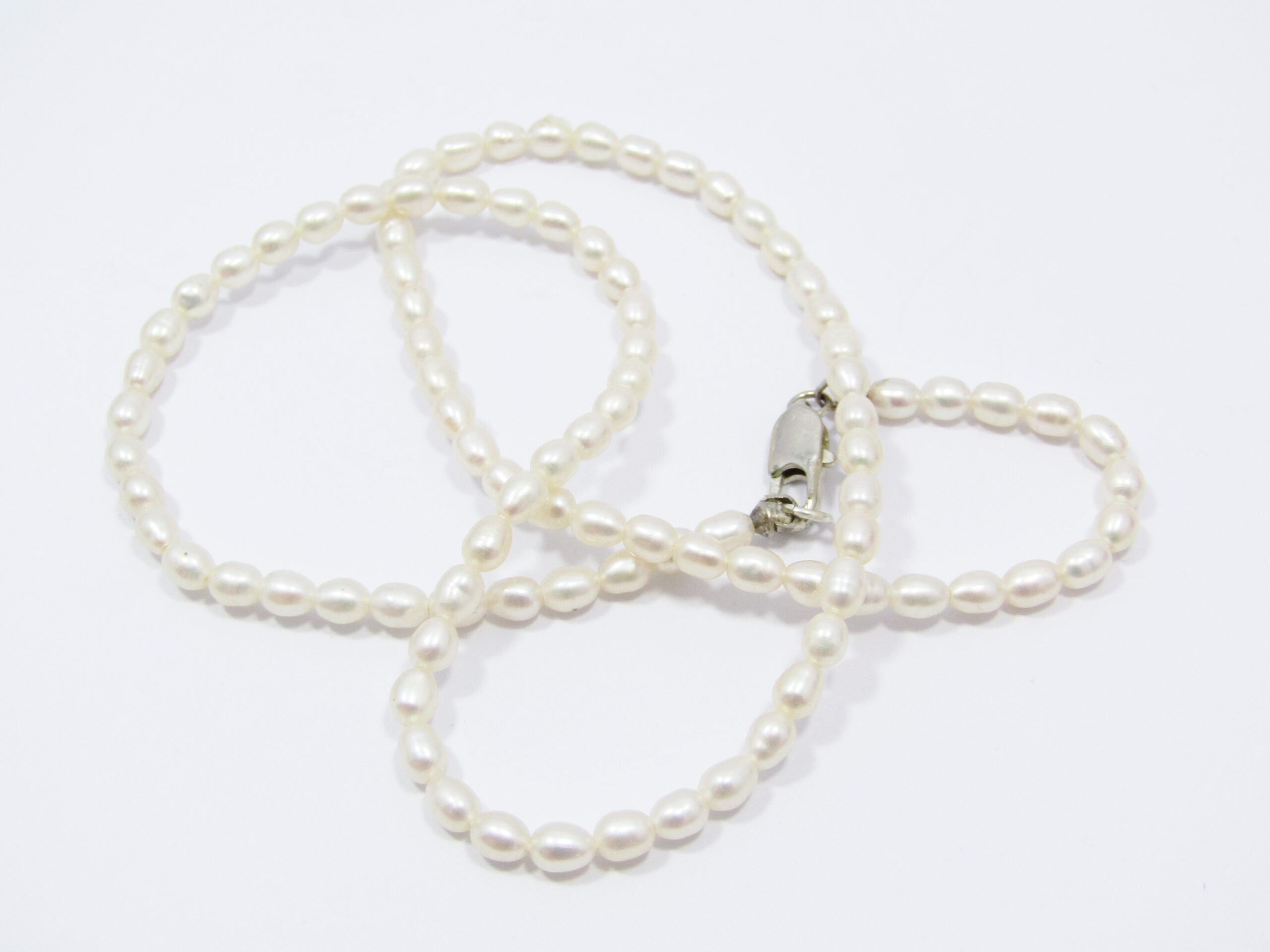 A Beautiful String of Fresh Water Pearls with a Sterling Silver Clasp
