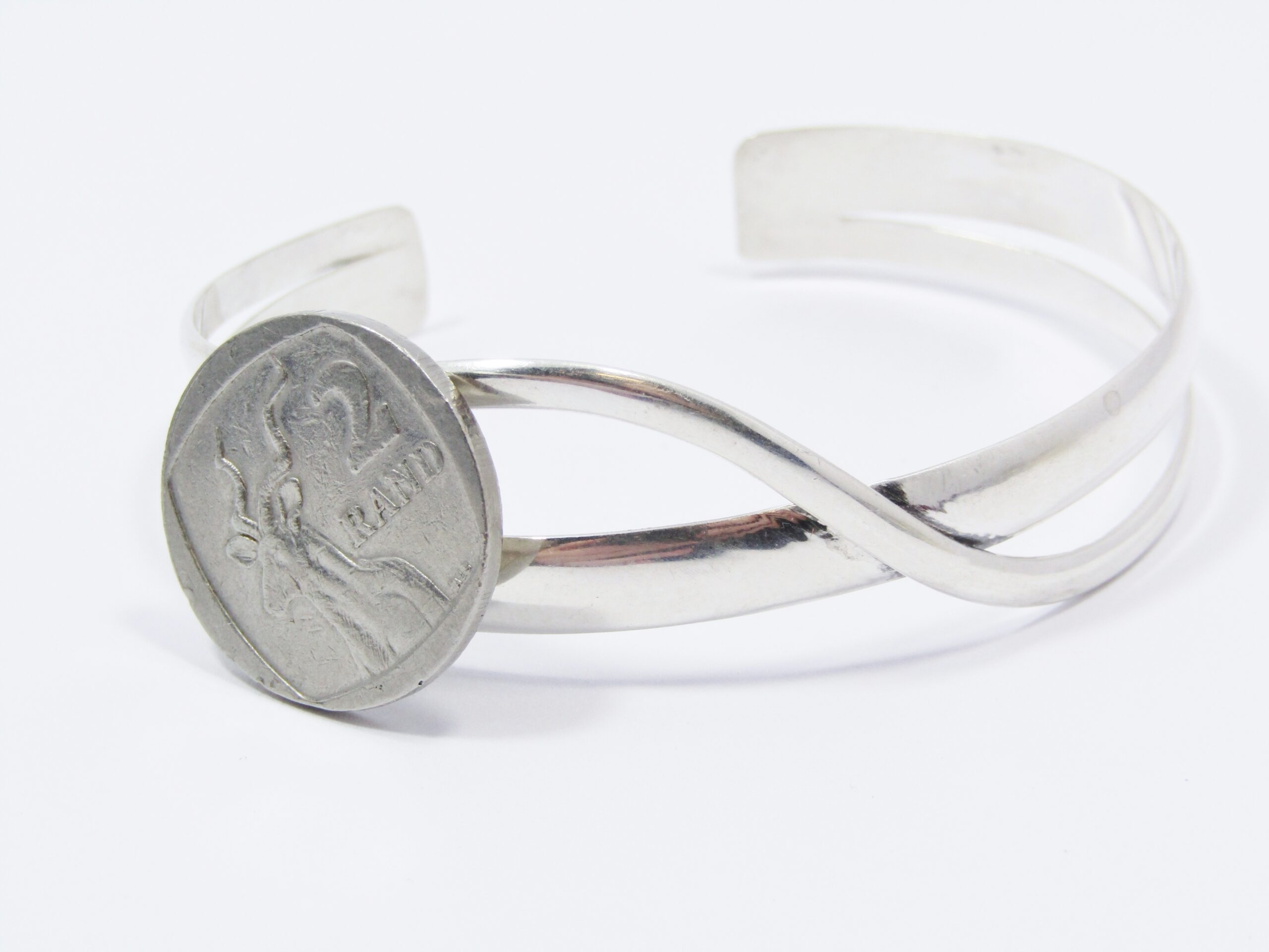A Stunning Cross Over Design Cuff Bangle in Sterling Silver.