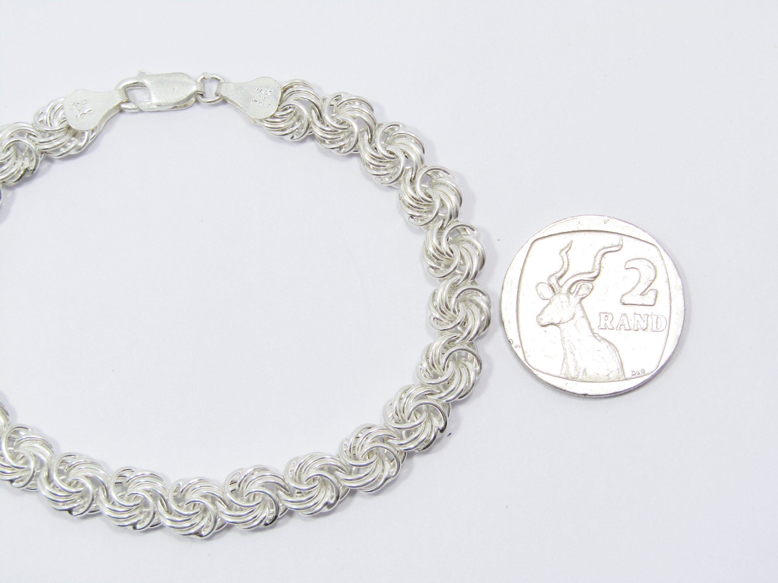 A Gorgeous Fancy Link Bracelet in Sterling Silver.