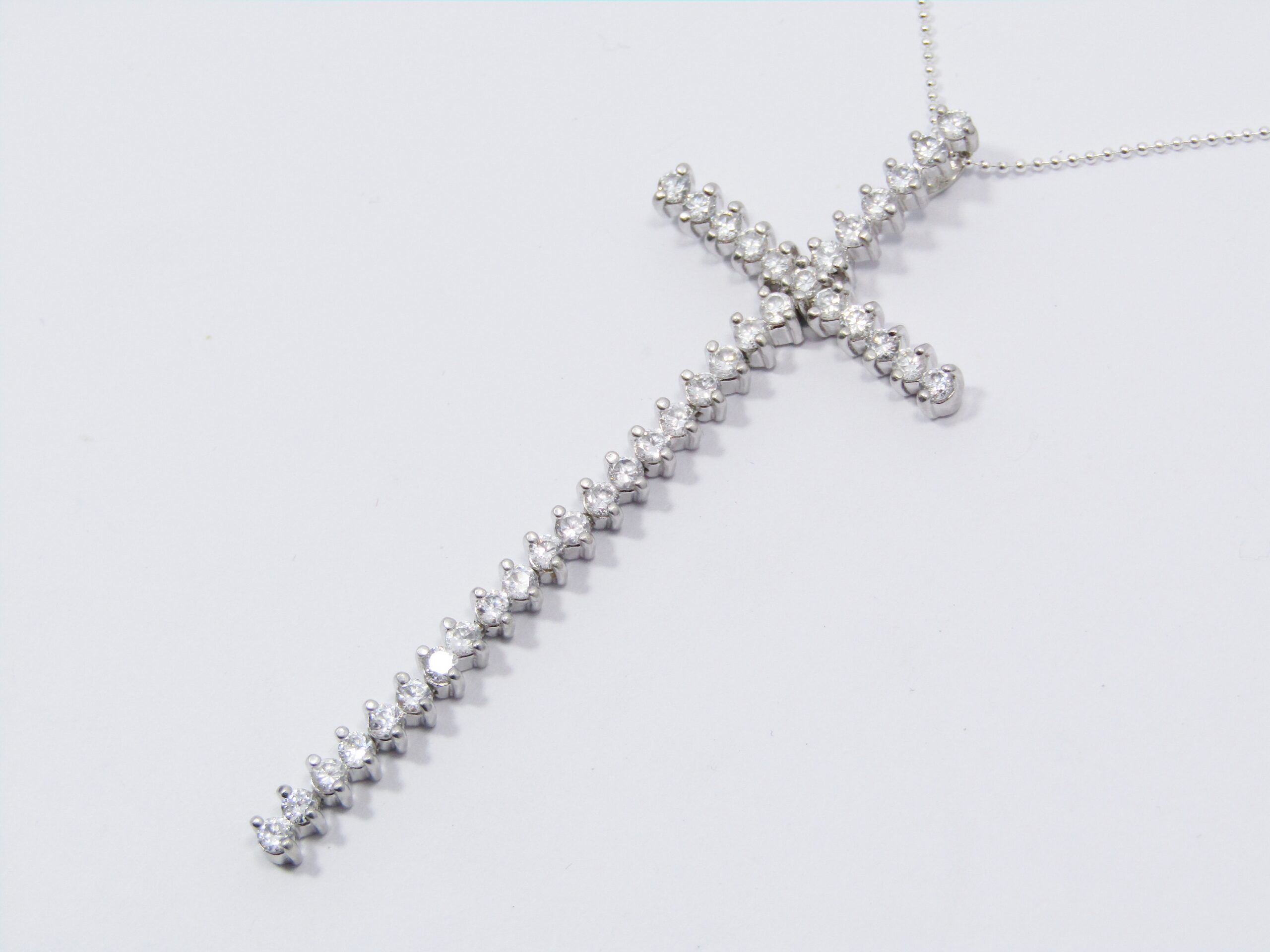 A Beautiful Long Zirconia Cross On Chain in Sterling Silver.