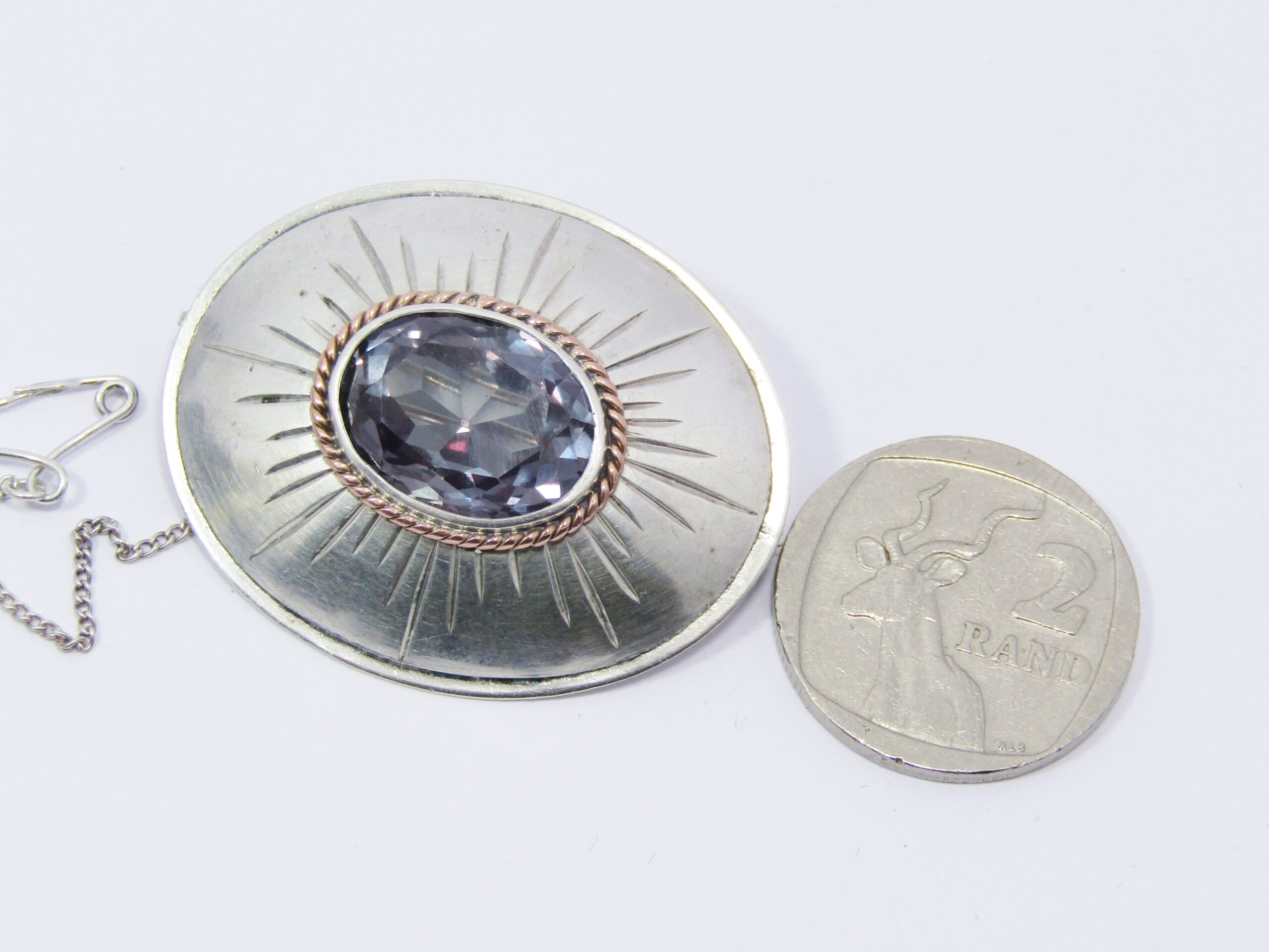 A Lovely Two Tone Vintage Lilac Stone  Brooch in Sterling Silver.