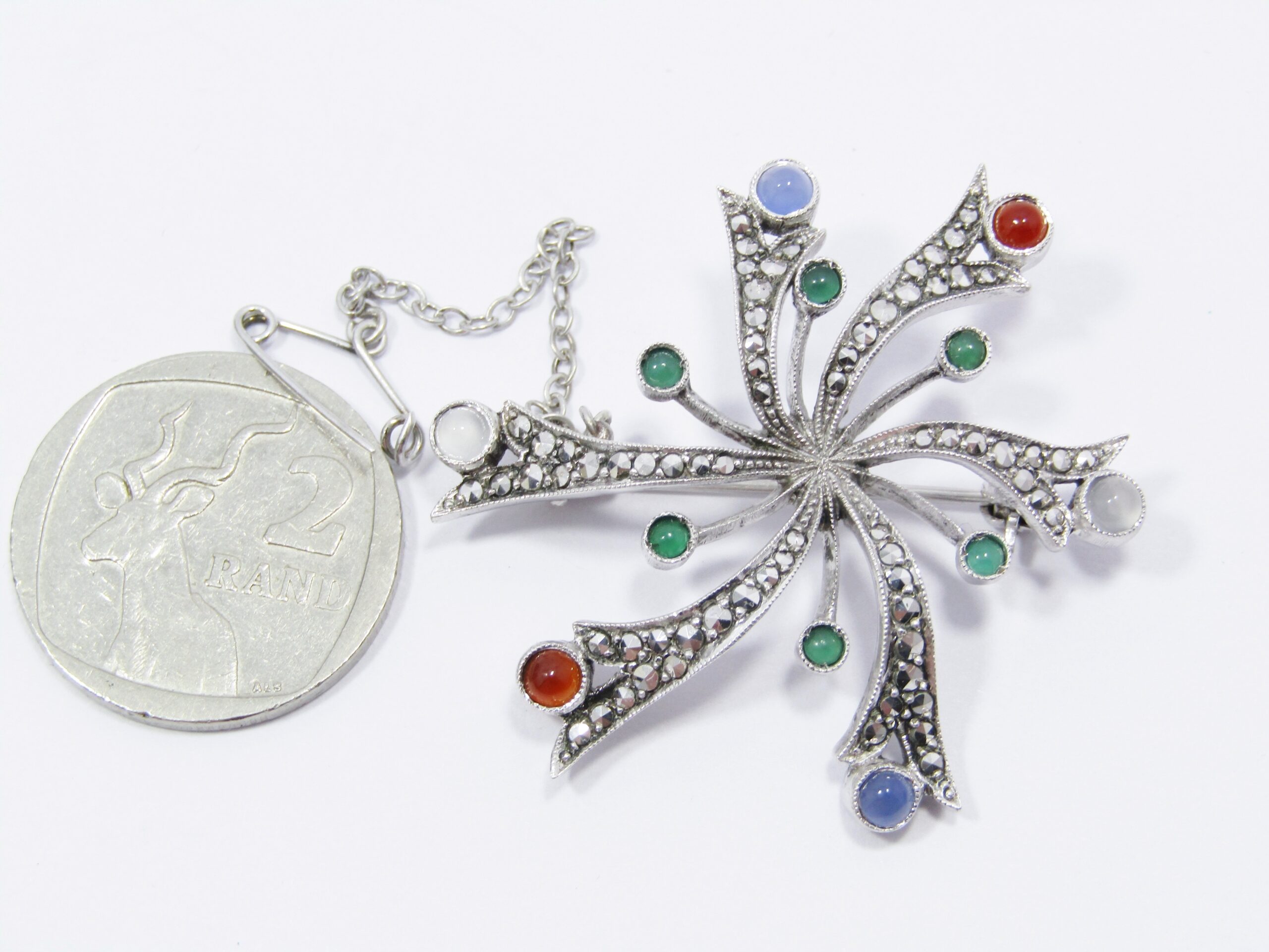 A Beautiful Multi Color Stone Brooch With Marcasite's in Sterling Silver.