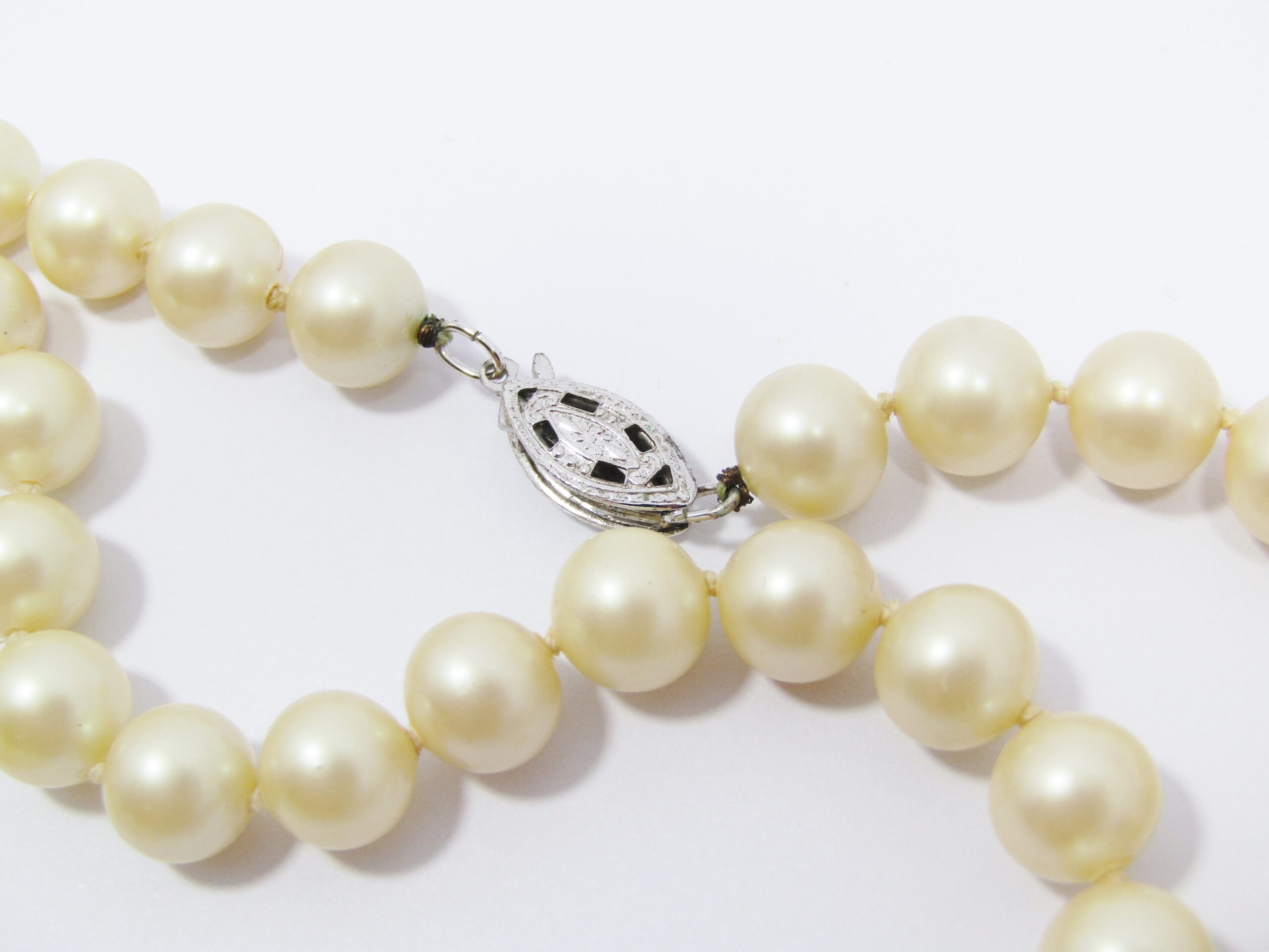 A Lovely String of Vintage Faux Pearls with a Sterling Silver Clasp