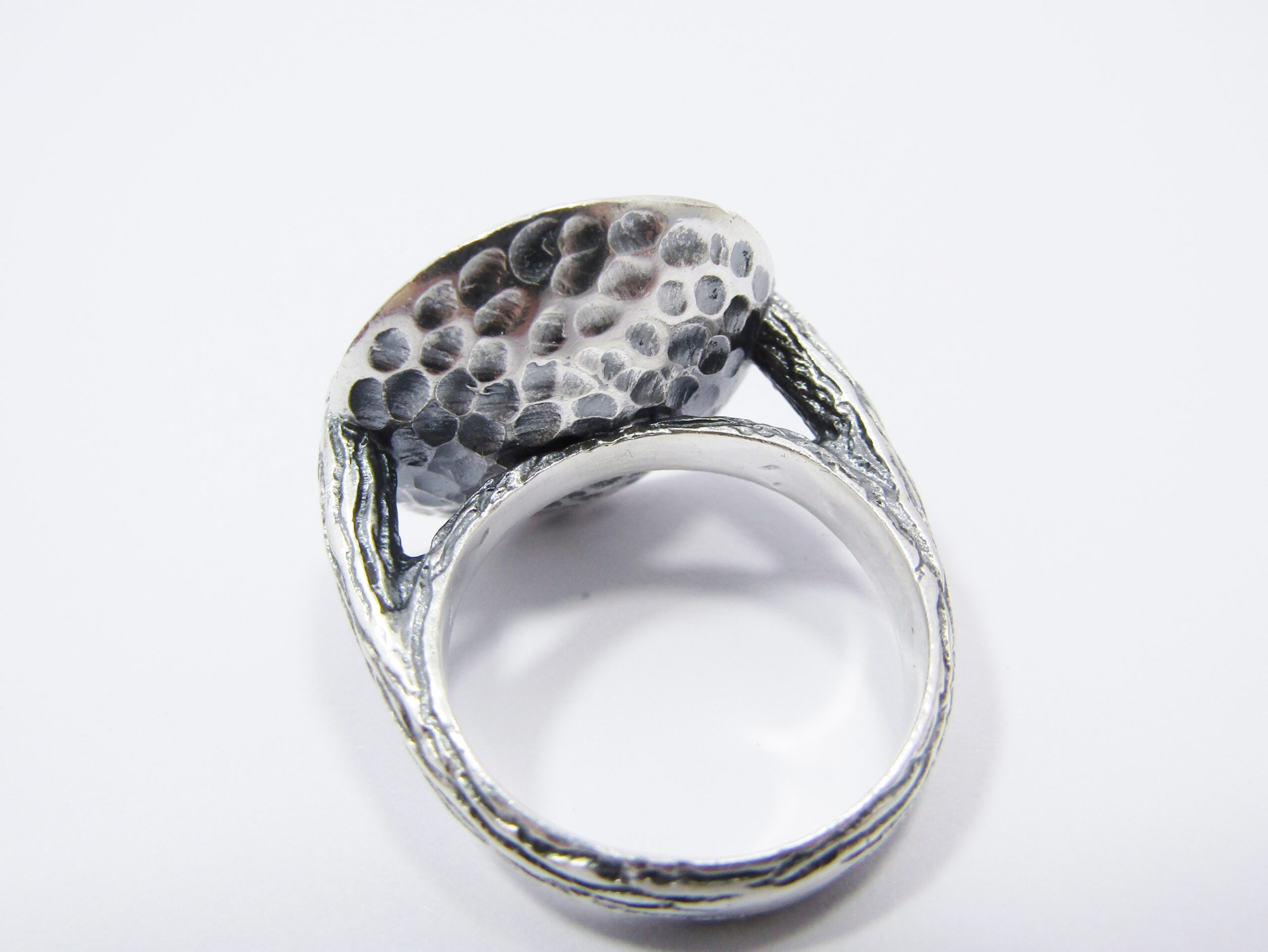 A Stunning Two Tone Brass over Sterling Silver ring with a Synthetic Ruby in Sterling Silver.