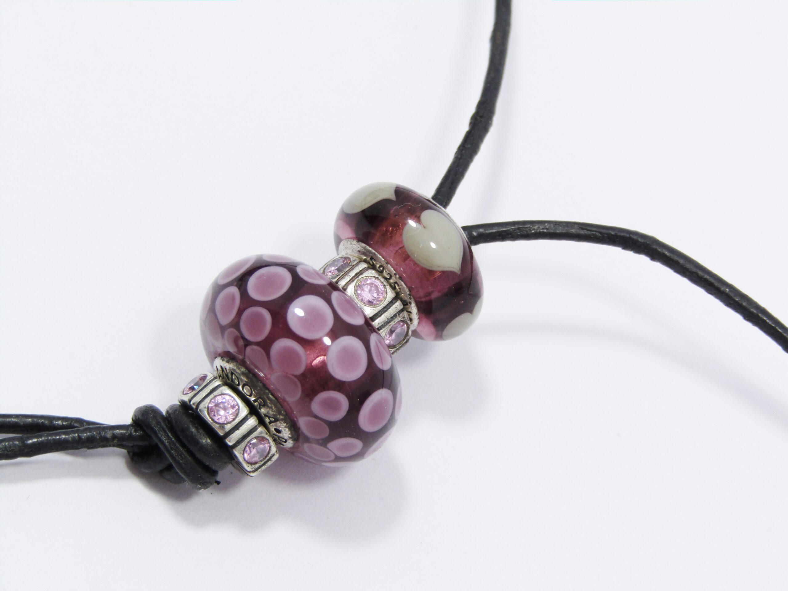 An Early Pandora Sterling Silver & Leather Fob