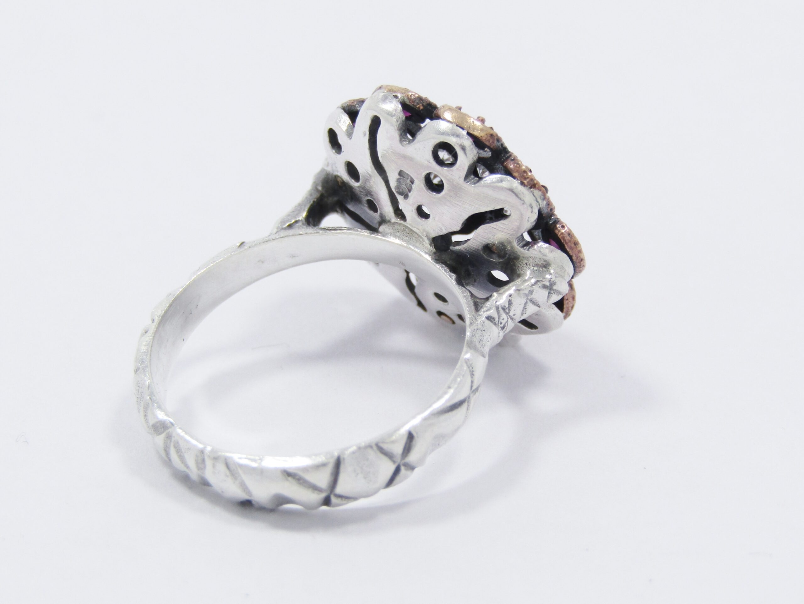 A Lovely Two Tone Eastern Design Ring With Pink and Clear Paste Stones in Sterling Silver.
