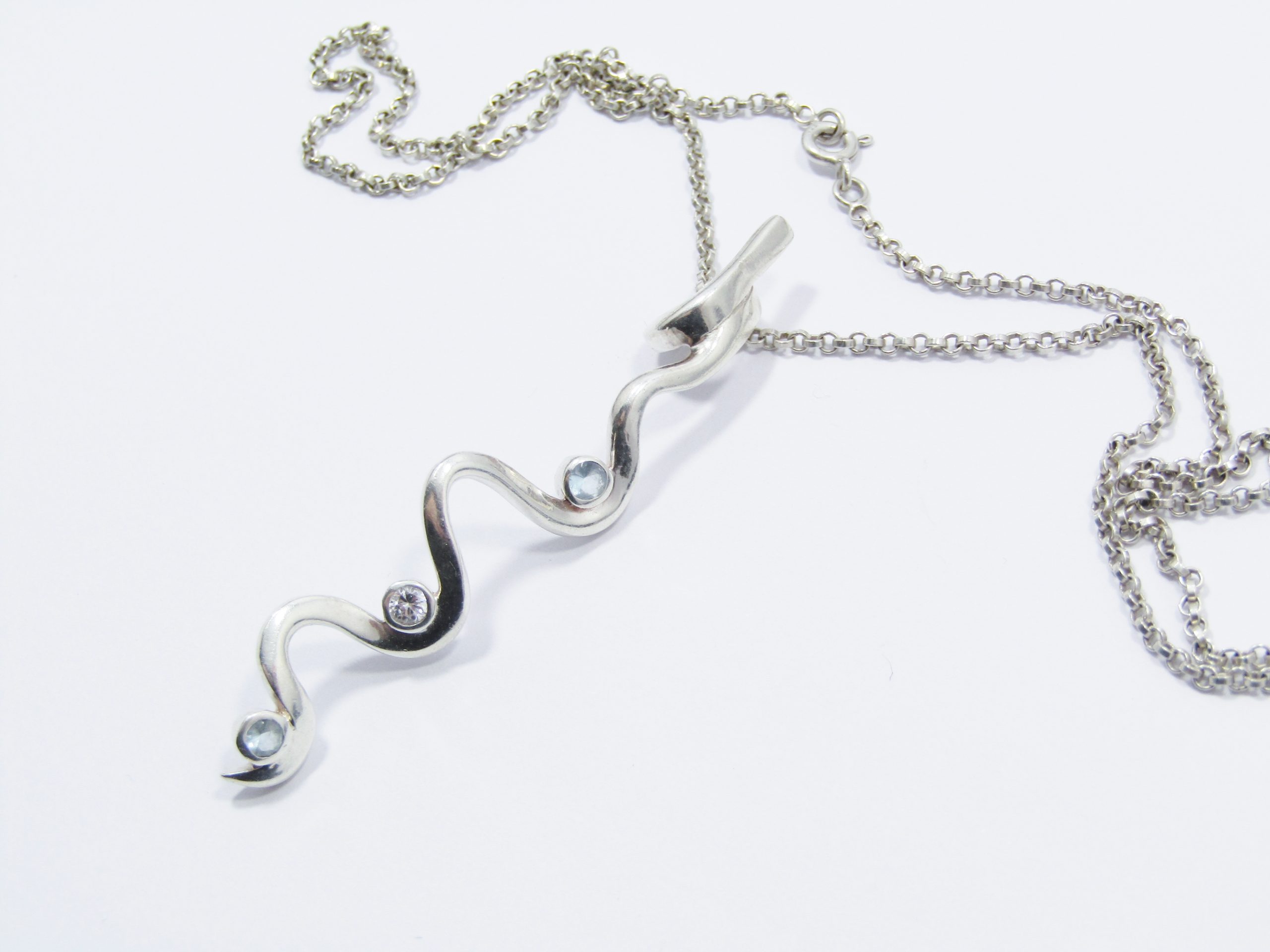 Beautiful Swirl Design Zirconia Pendant on Chain in Sterling Silver
